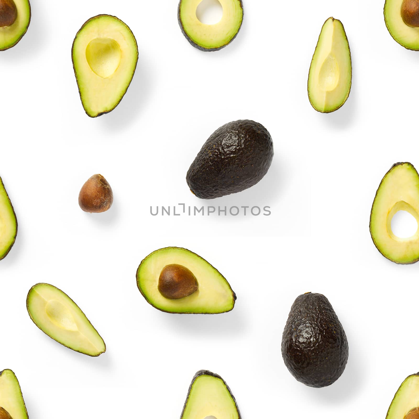 Seamless pattern with avocado slices. Tropical fruit abstract background. Avocado pattern the white background
