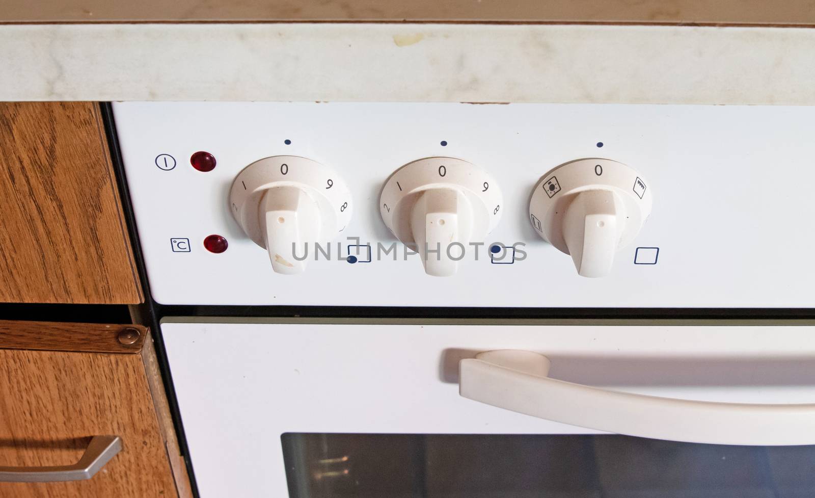 Antique kitchen with dirty oven by michaklootwijk