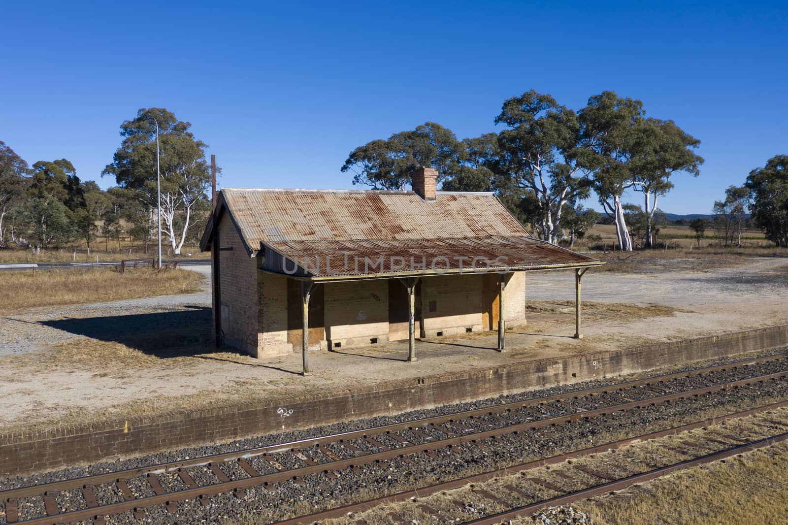 Old train station near a railway track in rural New South Wales, Australia.