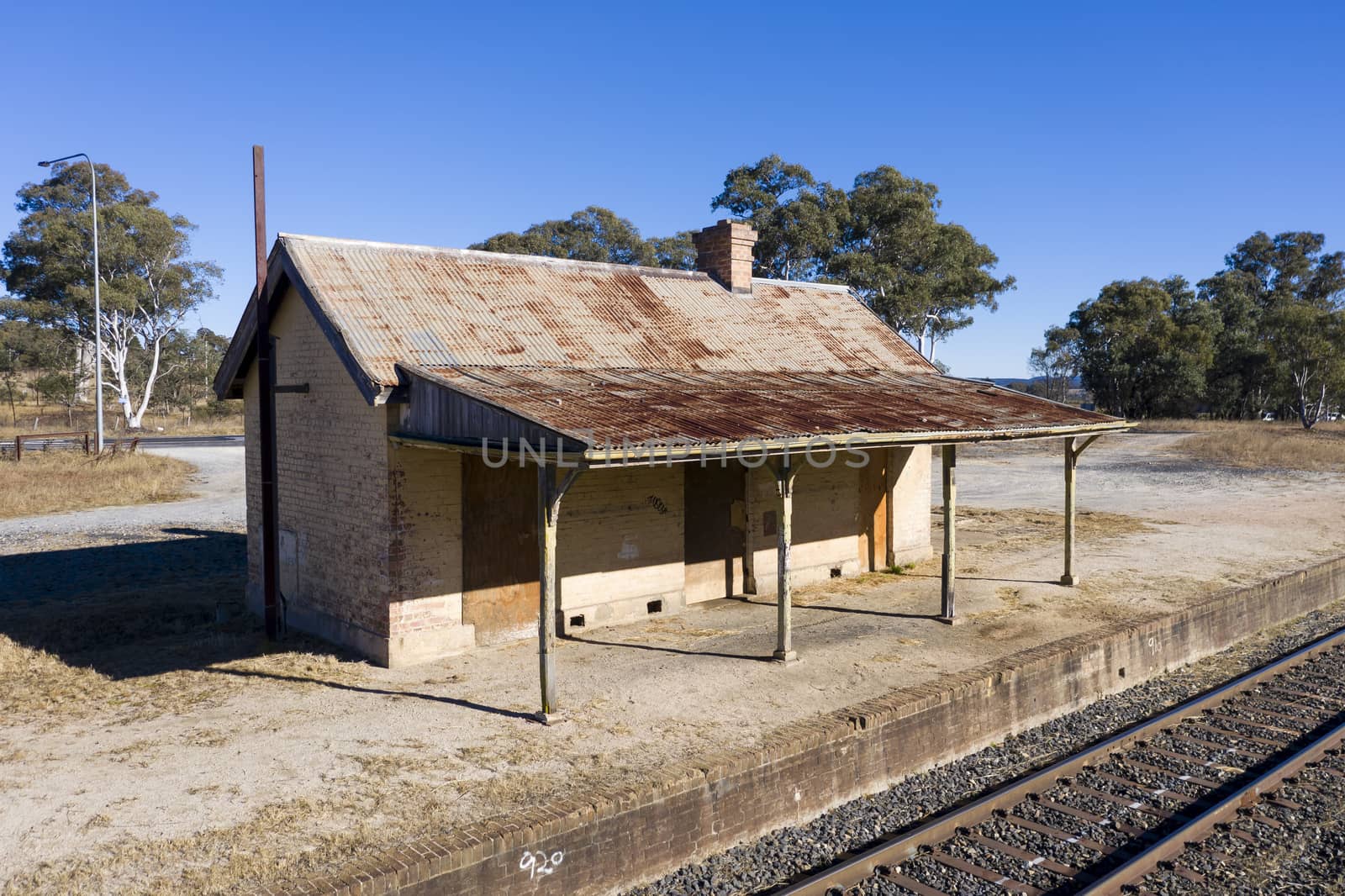 Old train station near a railway track in rural New South Wales, Australia.