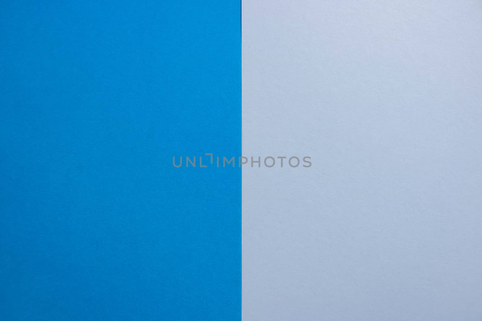 Blue-white matte suede background, close-up. Velvety texture