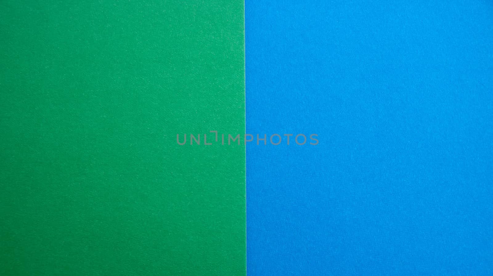 blue-green matte suede background, close-up. Velvety texture