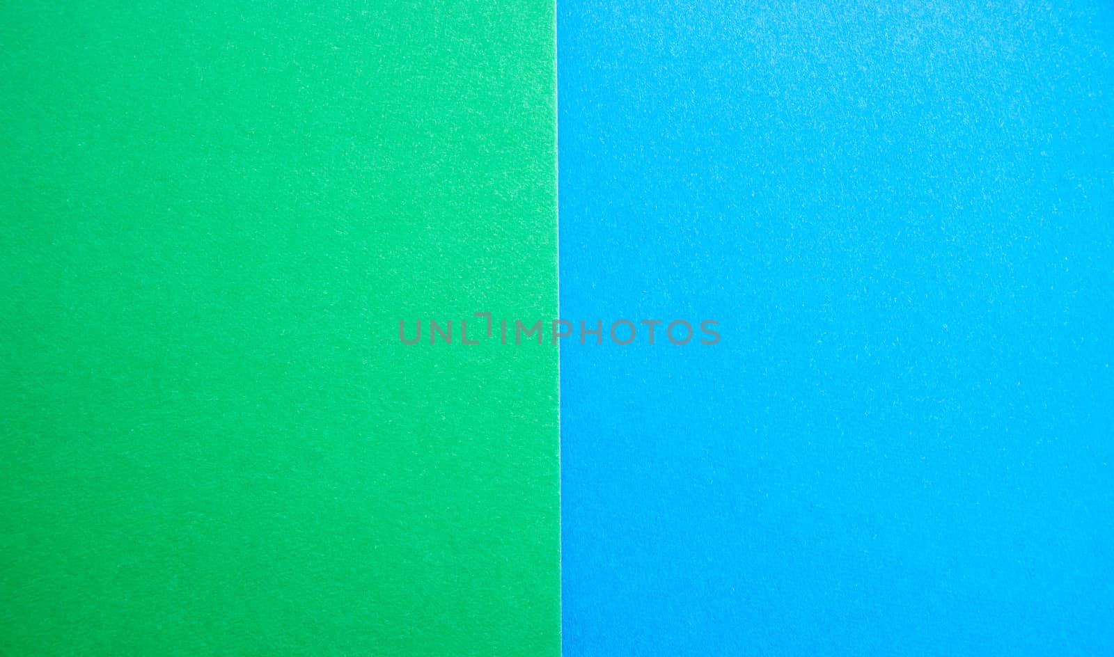 blue-green matte suede background, close-up. Velvety texture