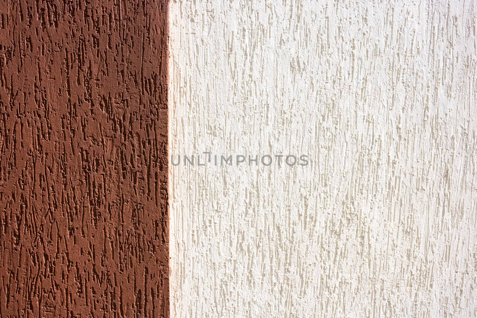 Decorative plaster background in two colors brown and white.