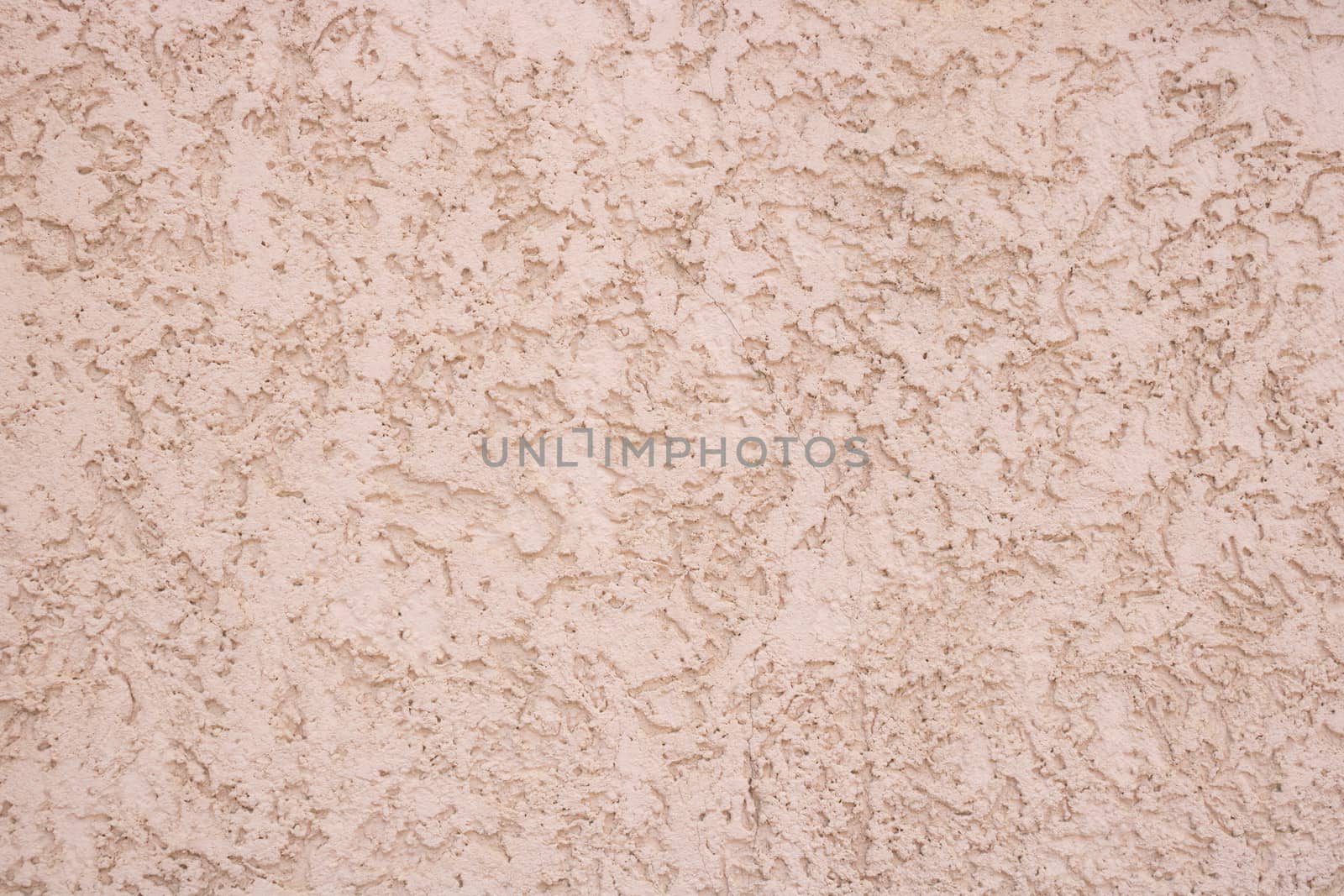 Pink decorative relief . Pink stucco wall. Pink background of the wall