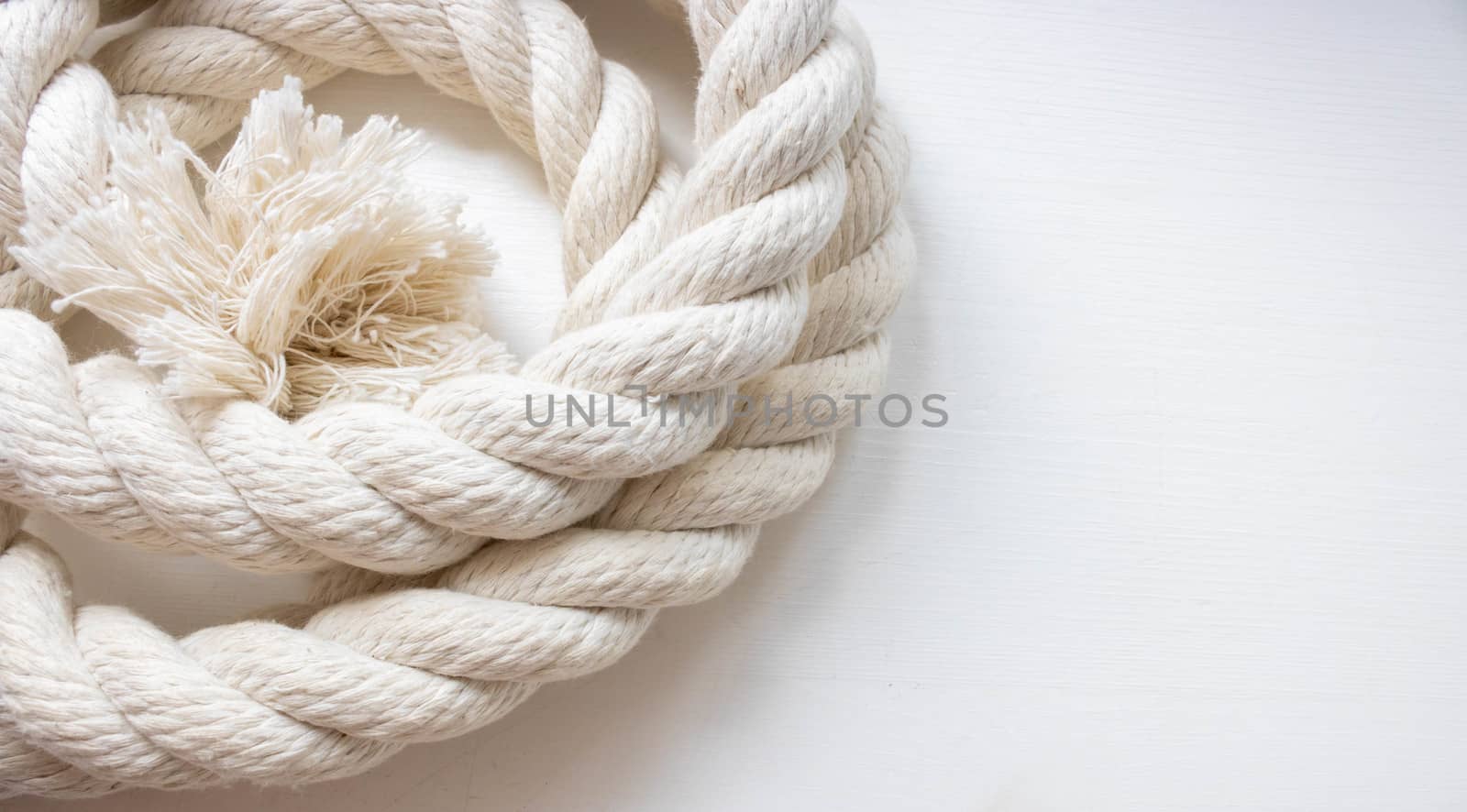 White thick rope isolated on a white background.Space for your text by lapushka62