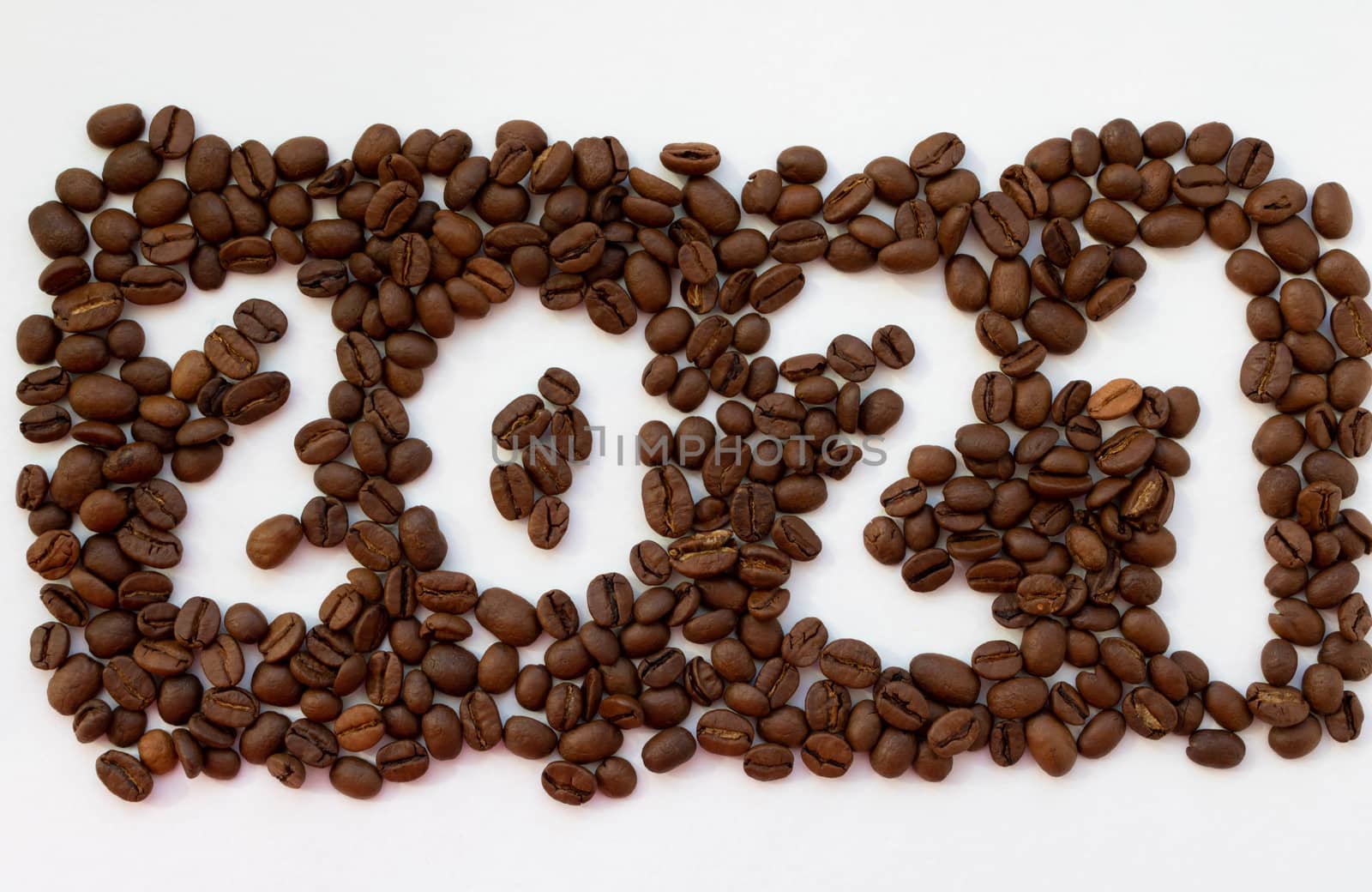 The number 2021 in coffee beans isolated on a white background.The concept of the new year