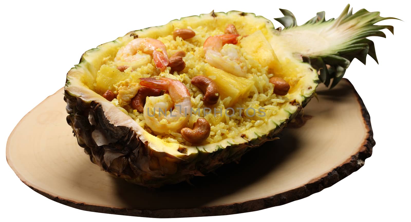 Fried Rice with Pineapple isolated on white background with clipping path by uphotopia