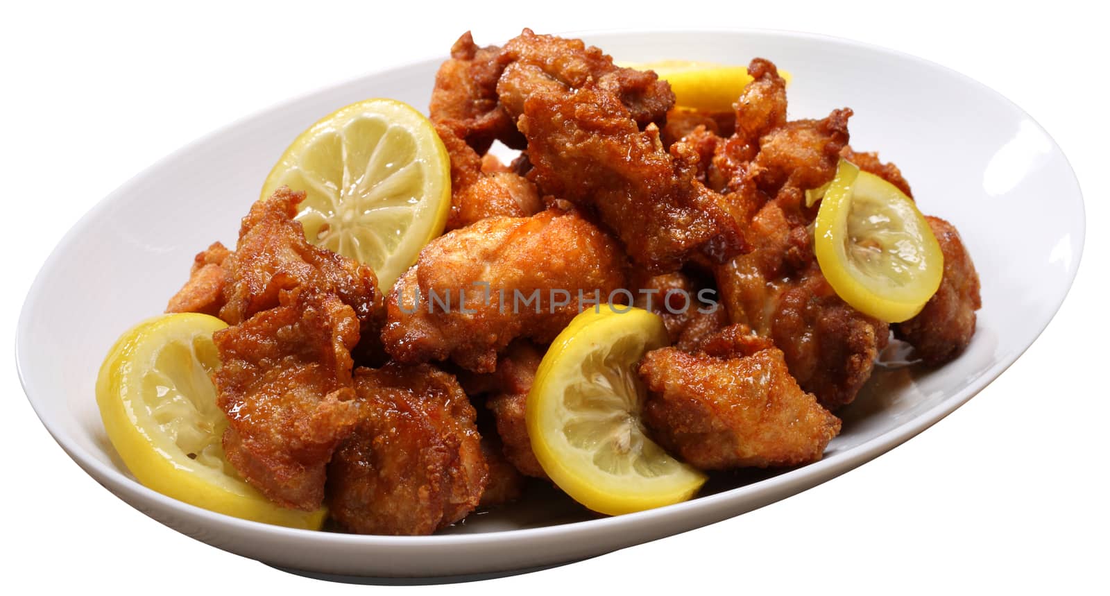 Deep-Fried Chicken Topped with Lemon Sauce isolated on white background with clipping path by uphotopia