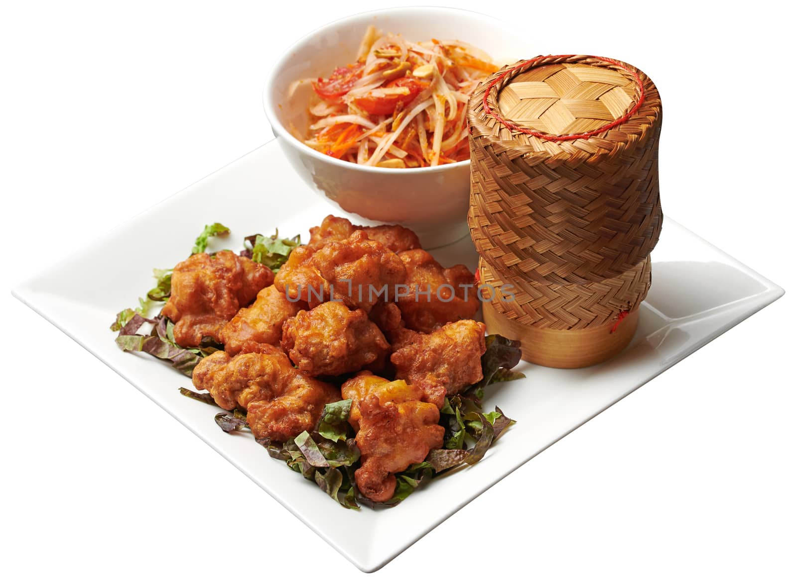 Deep-Fried Chicken Served with Papaya Salad and Sticky Rice isolated on white background with clipping path