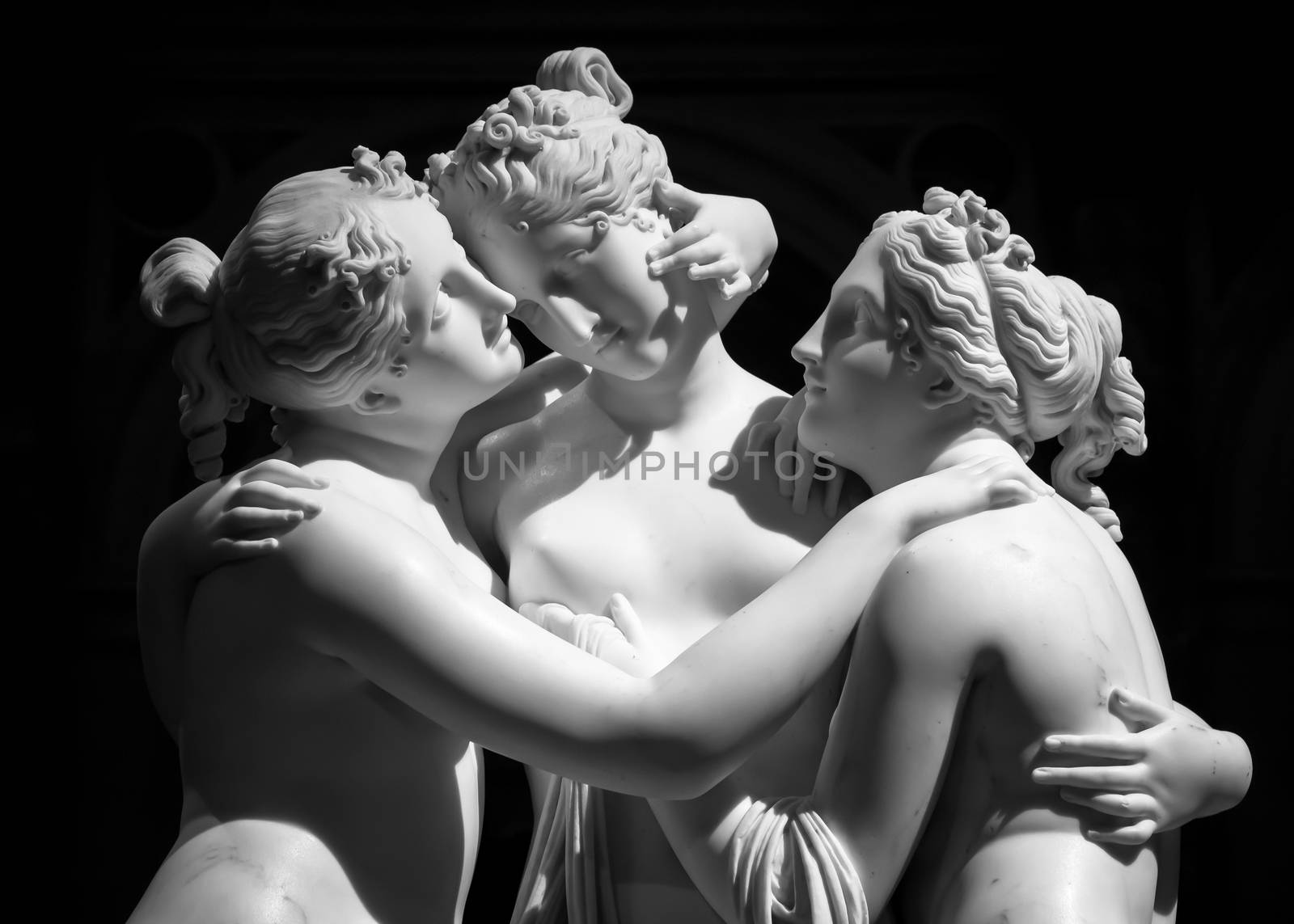 Milan, Italy - June 2020: Antonio Canova’s statue The Three Graces (Le tre Grazie). Neoclassical sculpture, in marble, of the mythological three charites (made in Rome, 1814-1817)