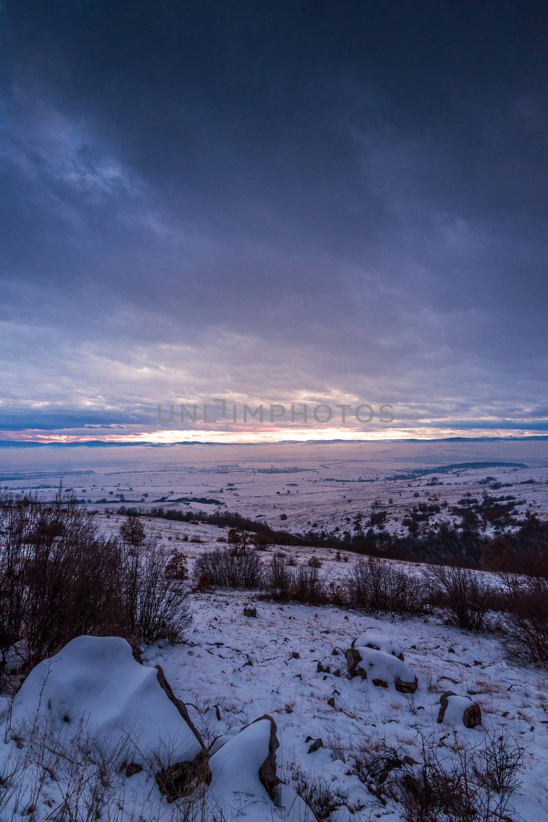 Mountain in the winter time duging sunset.