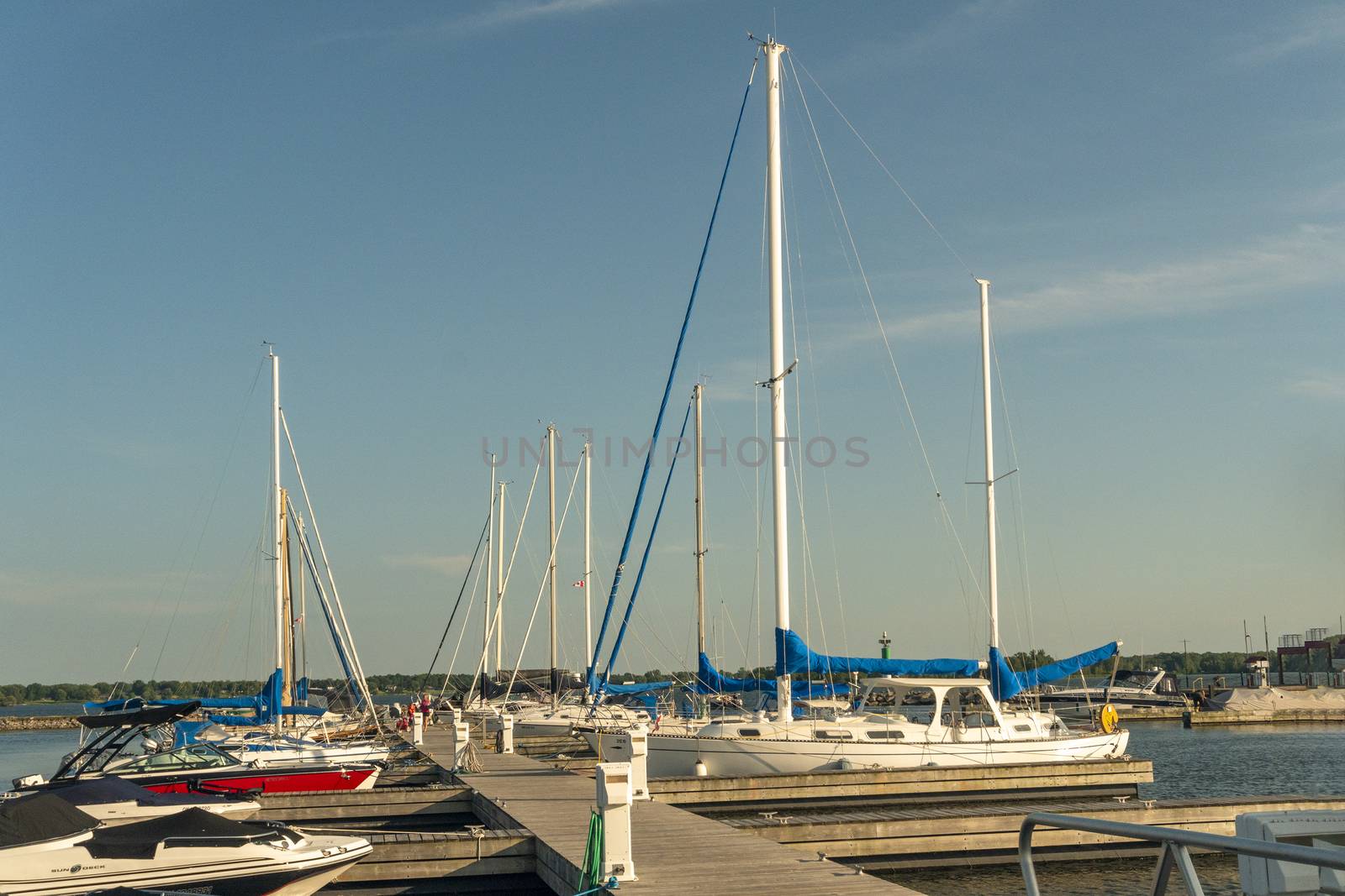 Yachts and boats on the pier in the river bay by ben44