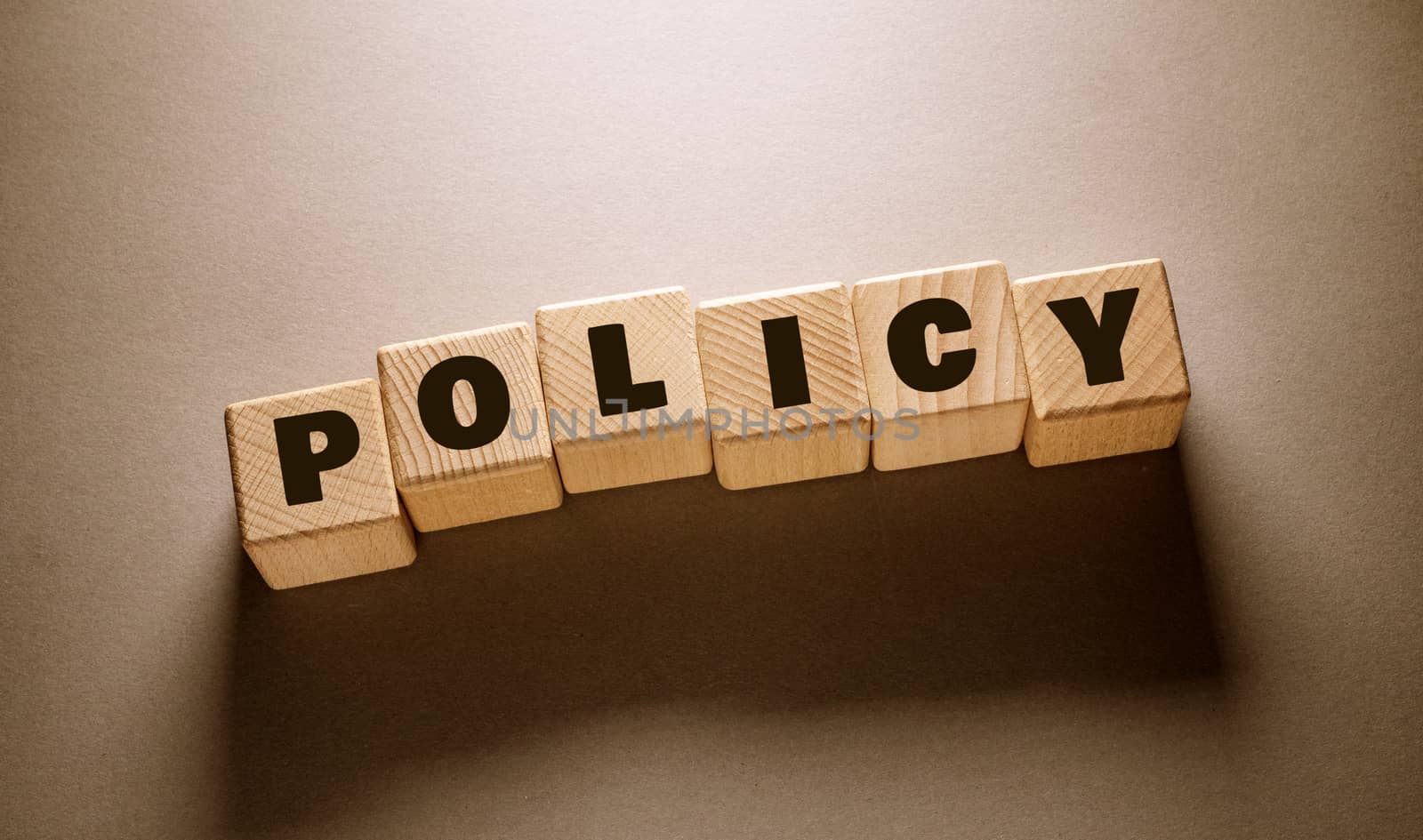policy Word Written on Wooden Cubes
