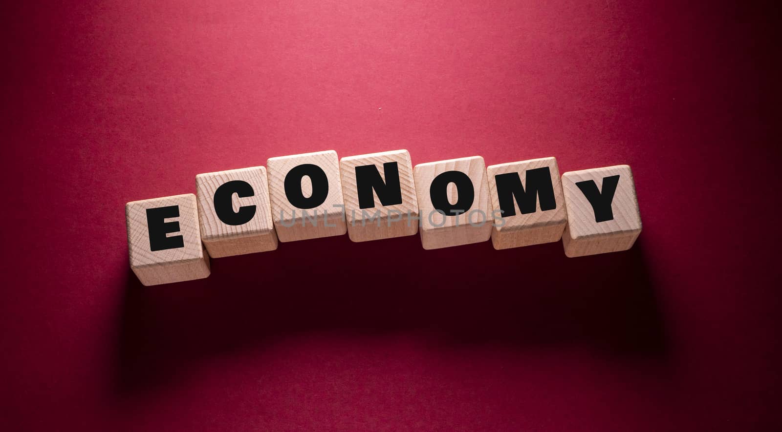 Economy Word with Wooden Cubes by Jievani