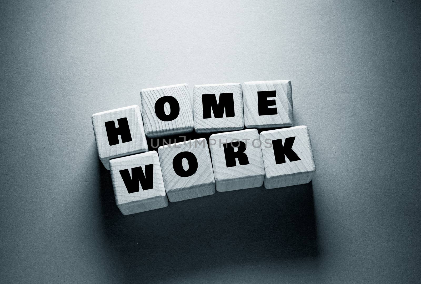 Home Work Word Written on Wooden Cubes