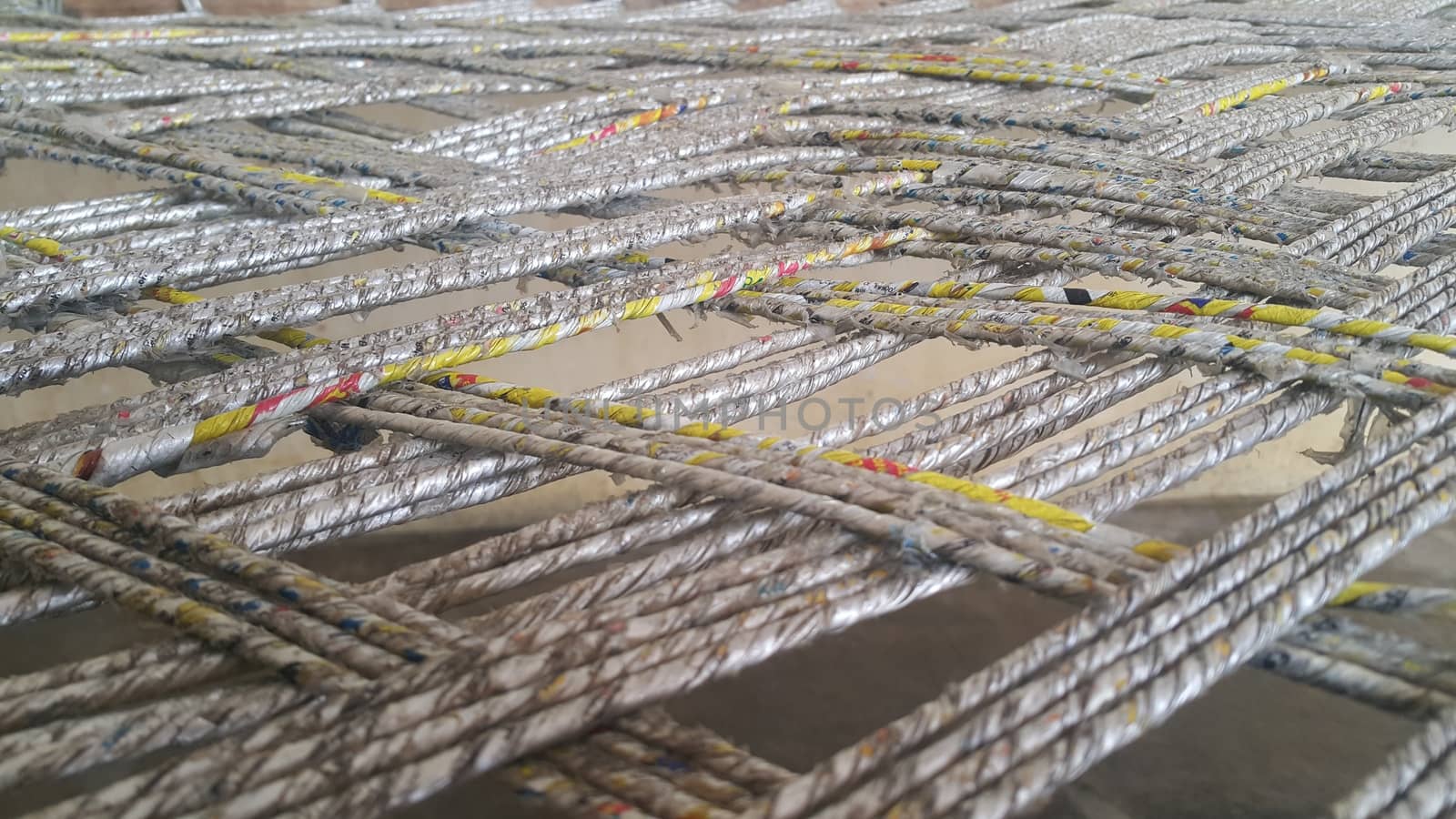 Closeup view of dried jute thread or ropes interwoven for making traditional old style bed called charpai