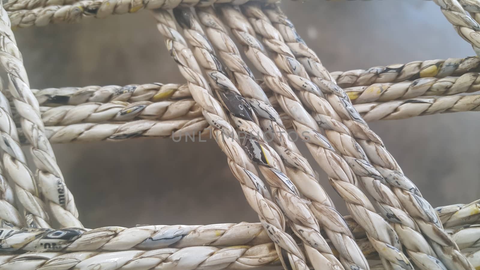 Closeup view of dried jute thread or ropes interwoven for making traditional old style bed called charpai