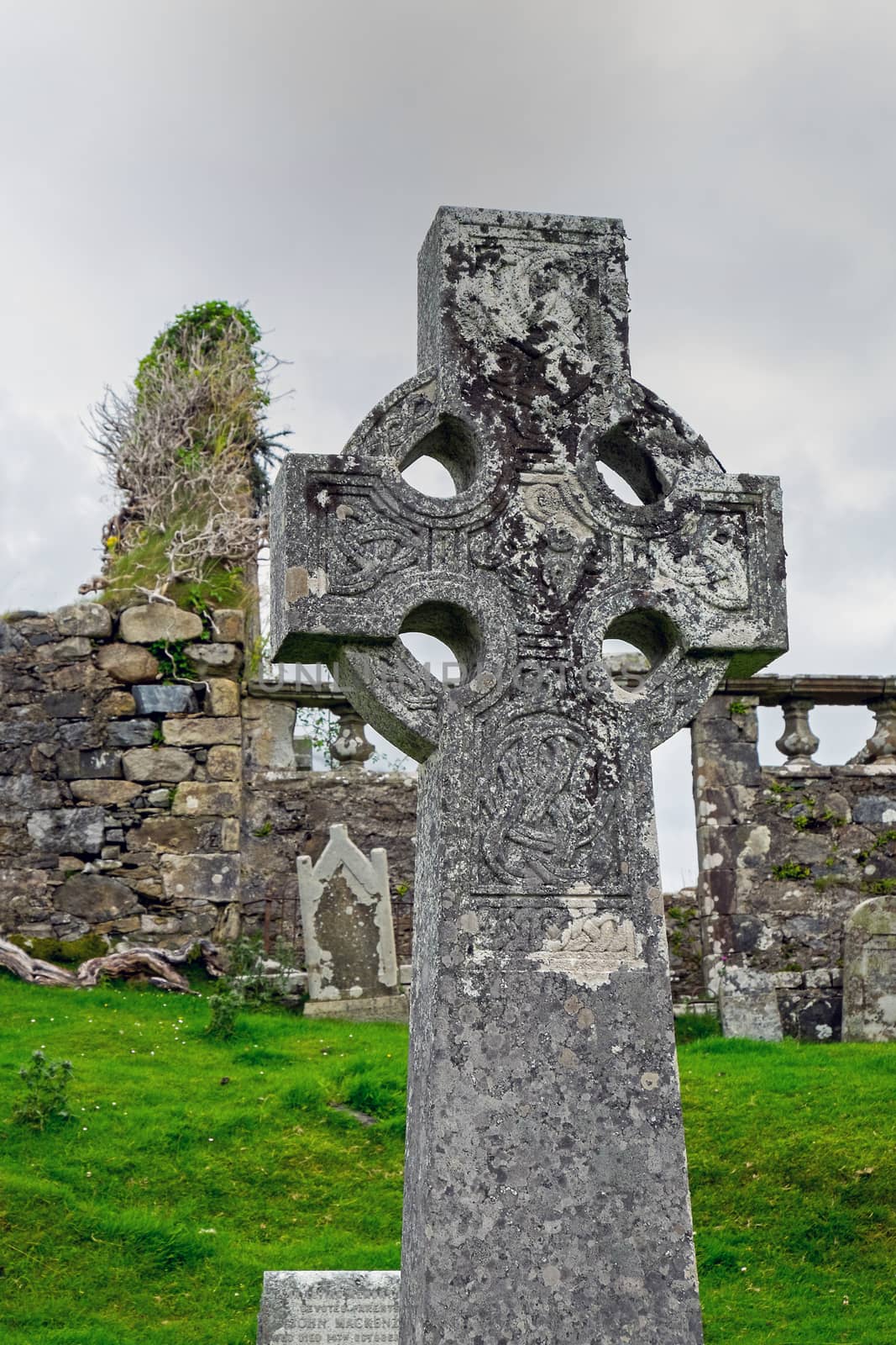 A celtic cross and an old cementary on the Isle of Skye in Scotland