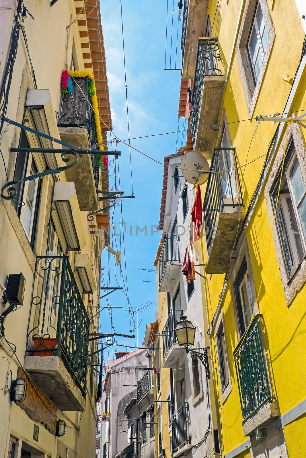 A small narrow street in the Alfama district in Lisbon, Portugal