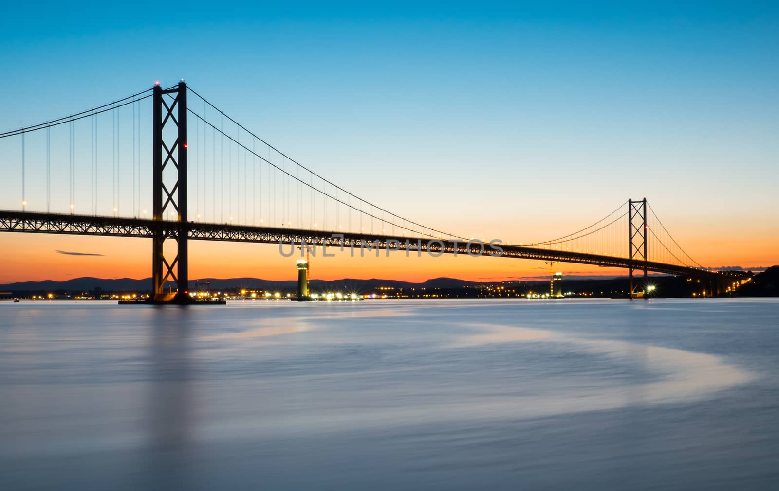 The Forth road bridge in Scotland after sunset