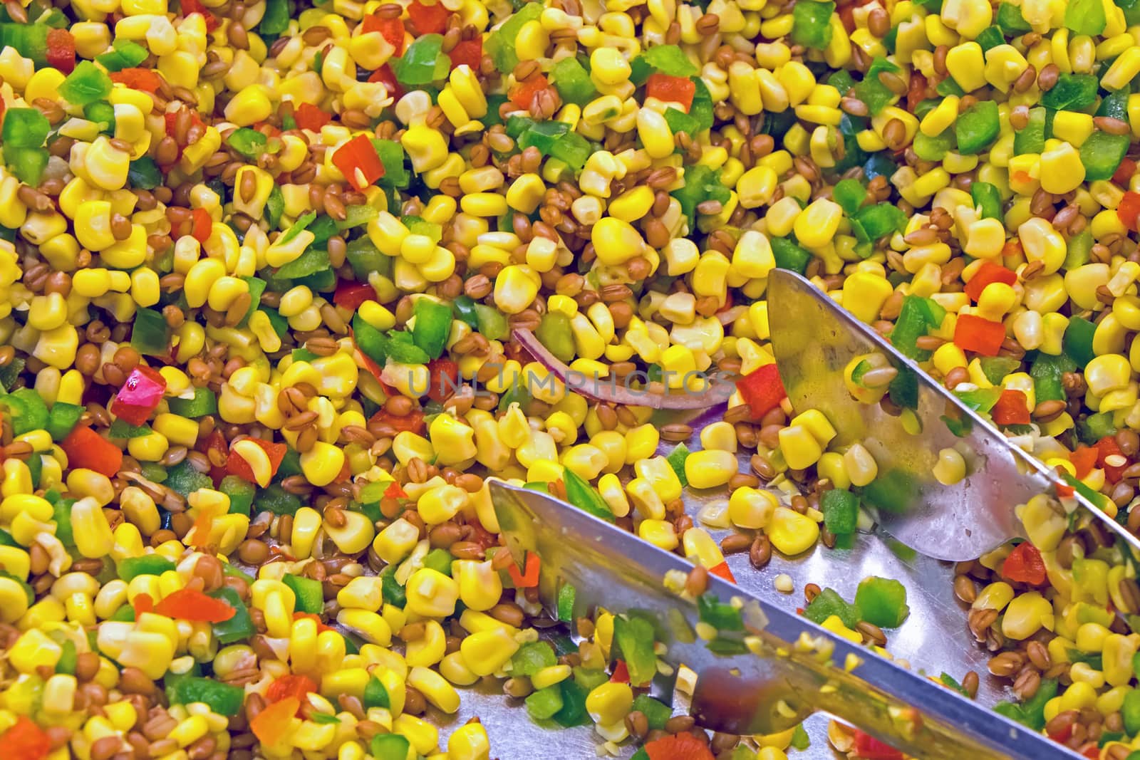 Salad with corn and paprika seen at a buffet