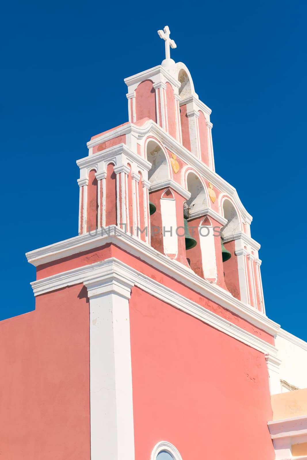 Typical greek belltower of a church on one of the islands