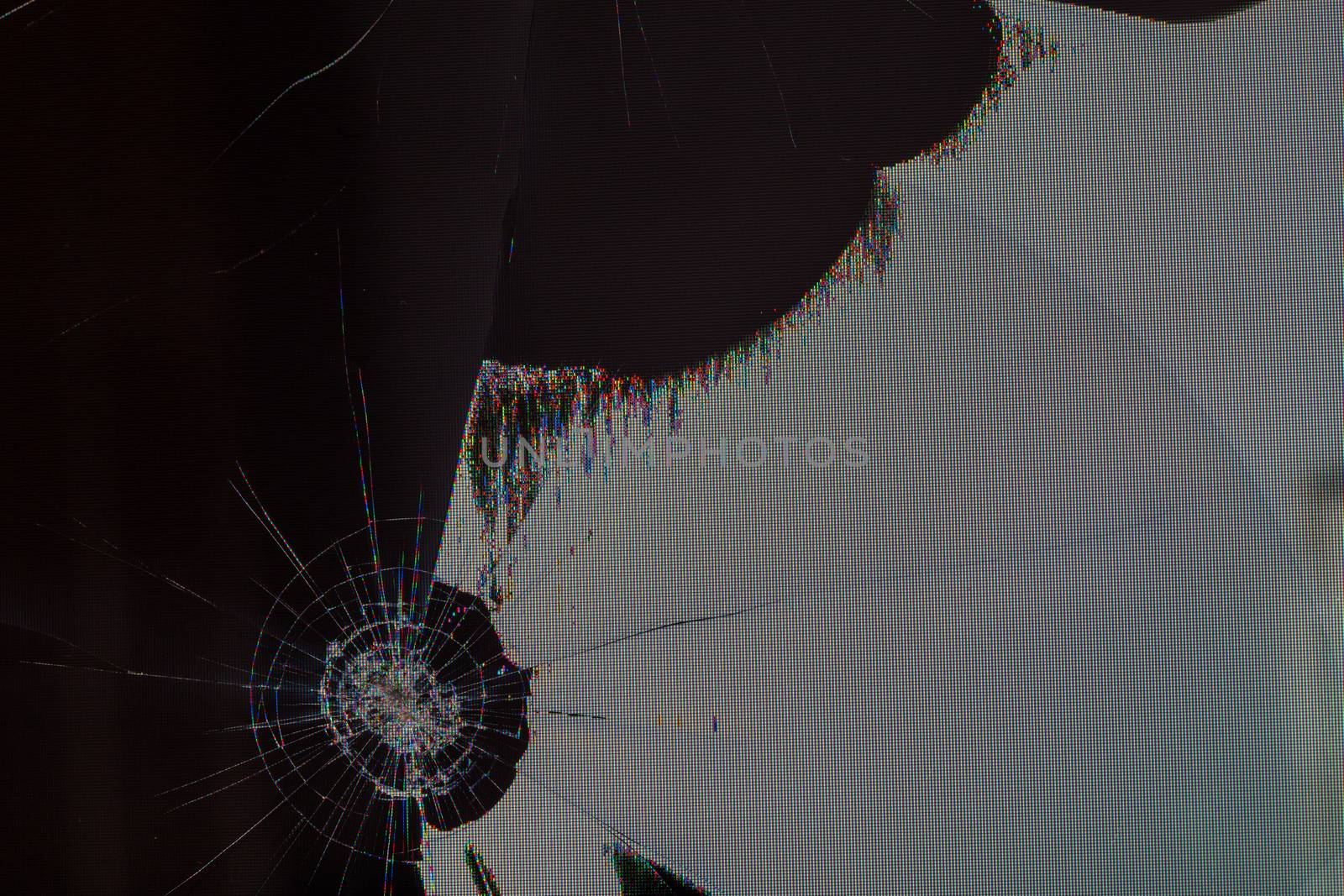 broken lcd tft tn screen flat macro texture with crystal leakage and physical damage cracks, closeup with selective focus and blur.