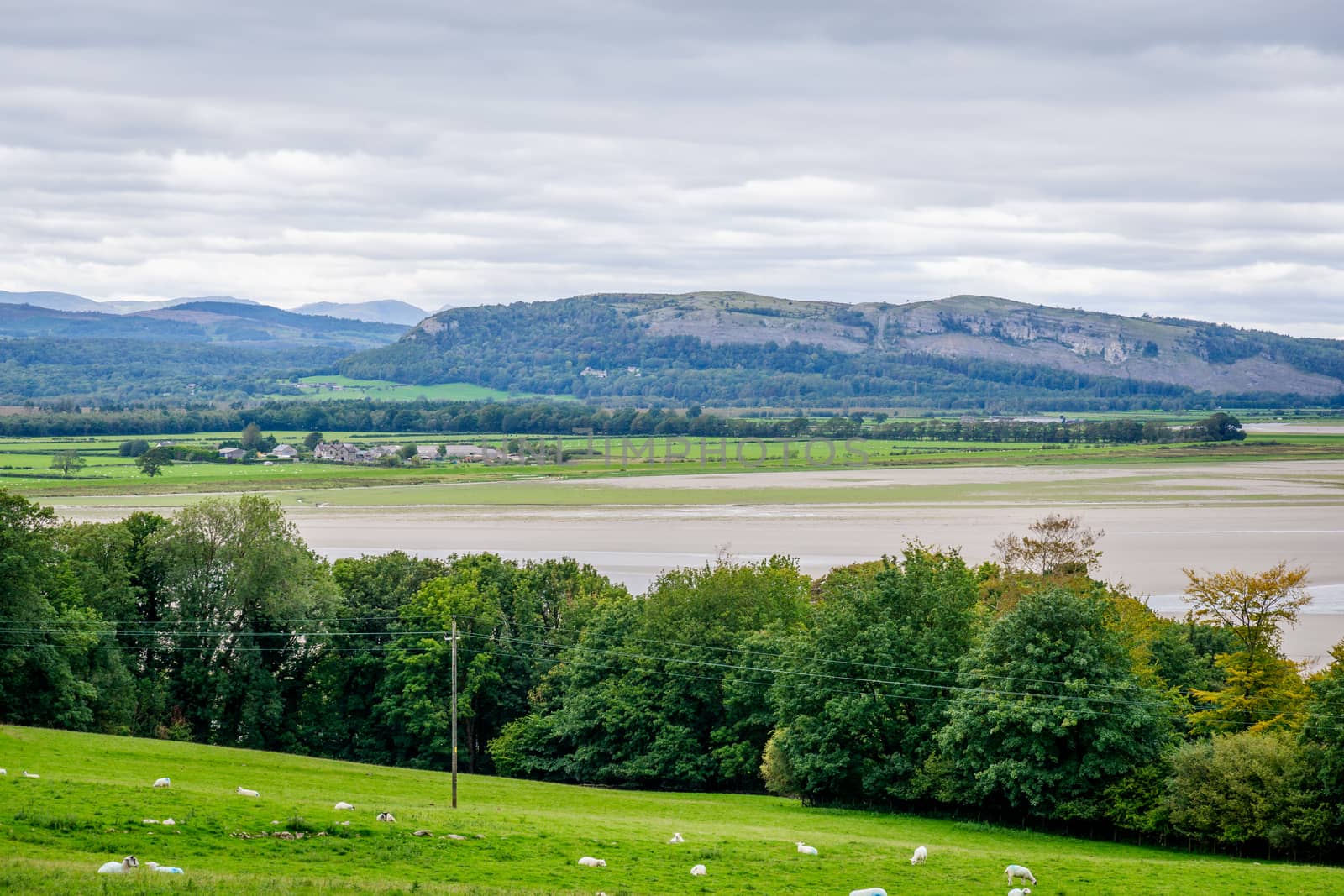 view over Morecambe Bay at Sandside toward Whitbarrow Scar by paddythegolfer