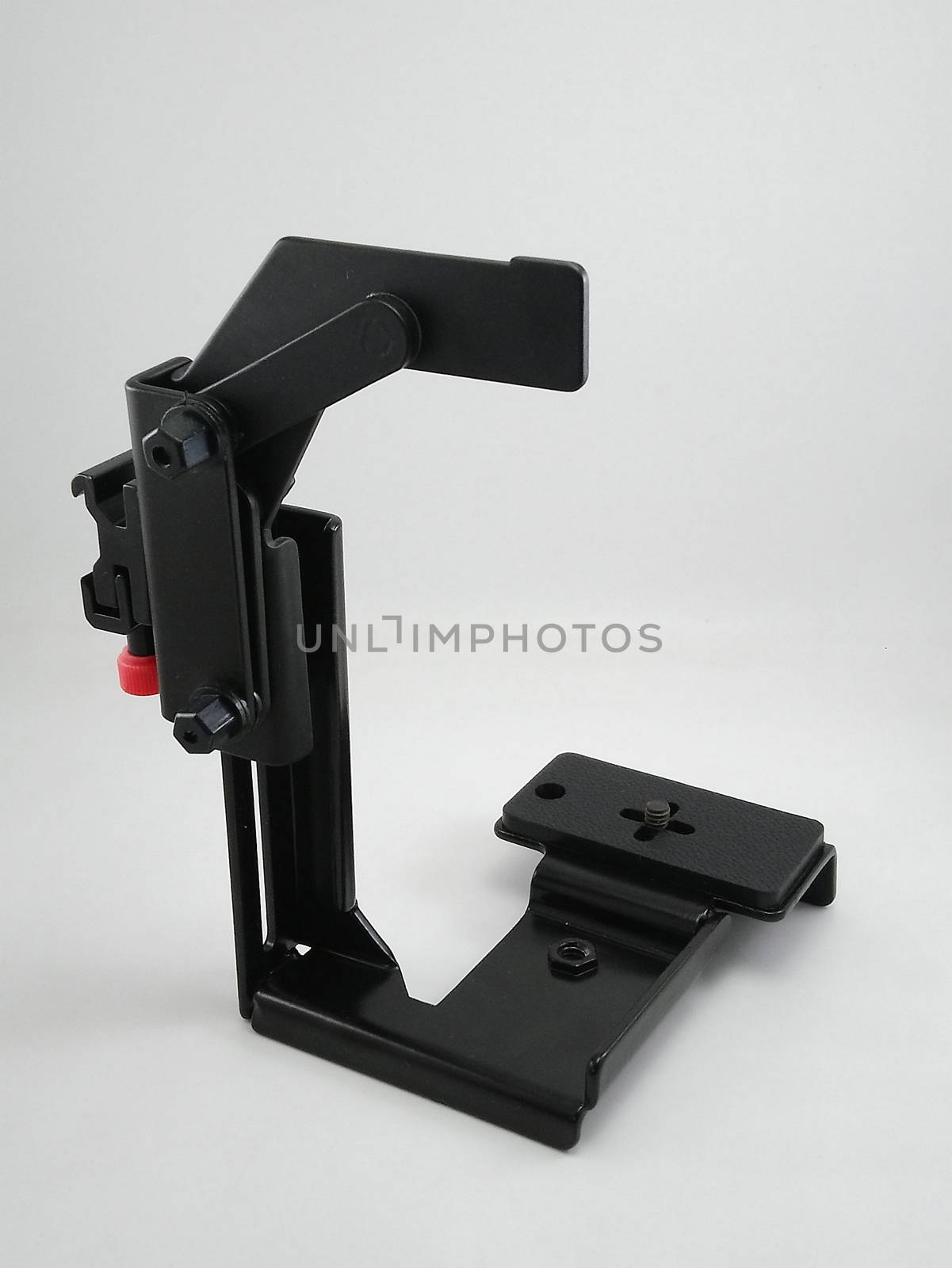 Black adjustable metal flash bracket photography accessory use to minimize the shadow of subject in portrait position