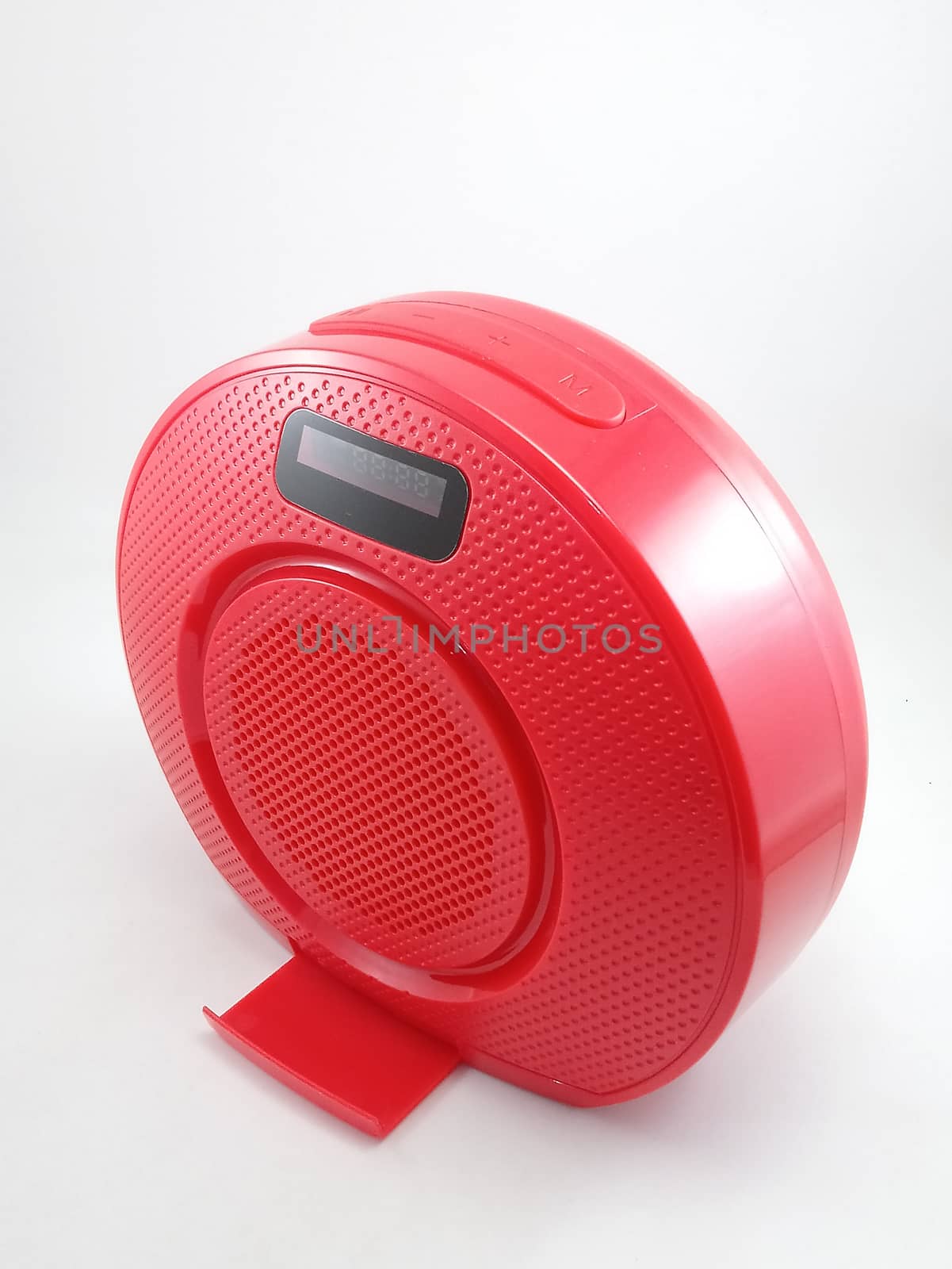 Bluetooth wireless speaker in red color use to play music from smartphone