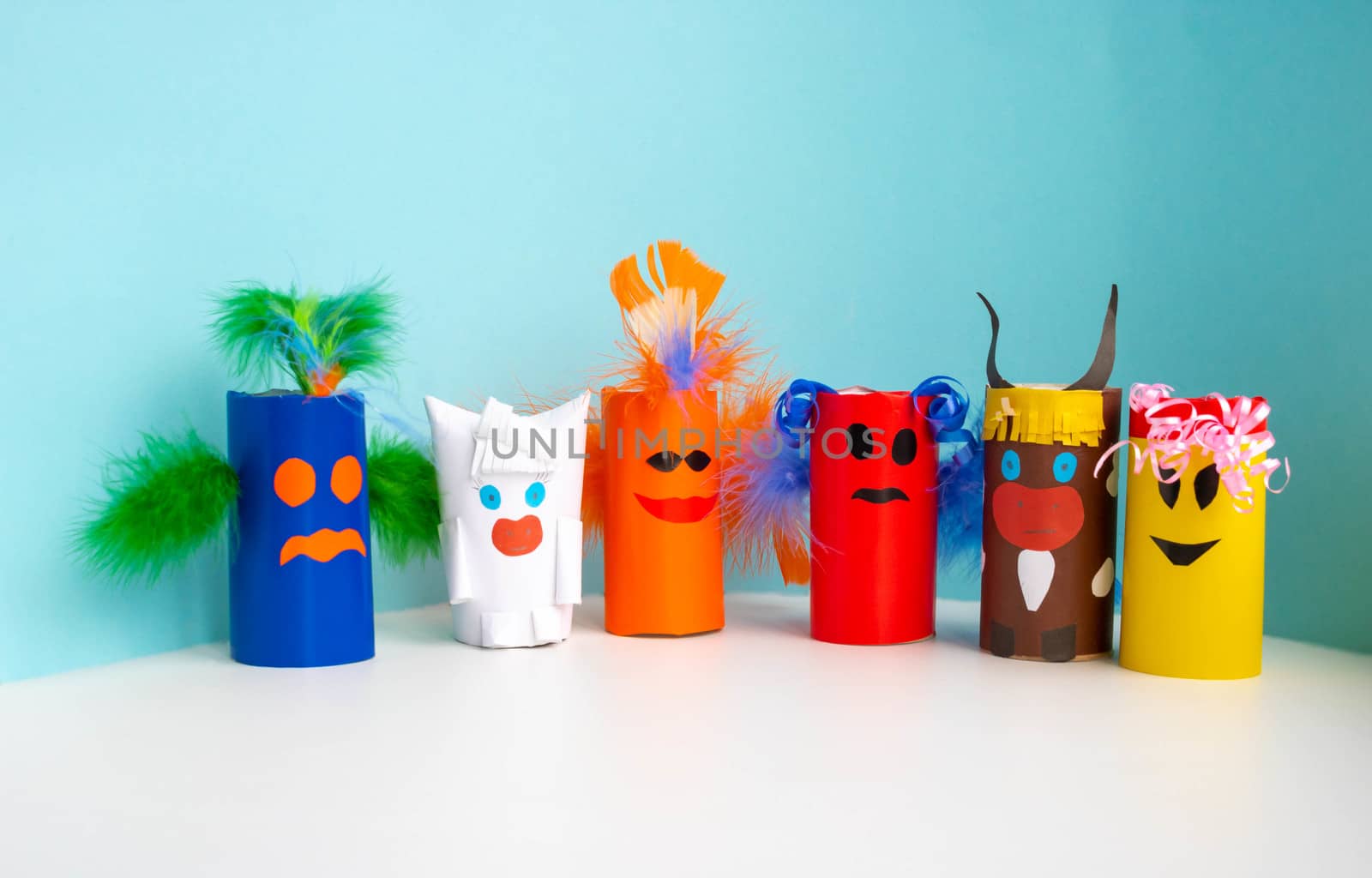 The concept of Halloween, carnival and New year .Jewelry-monsters from a roll of toilet paper. Simple crafts, creative idea, DIY. ECO-friendly re-use of coils