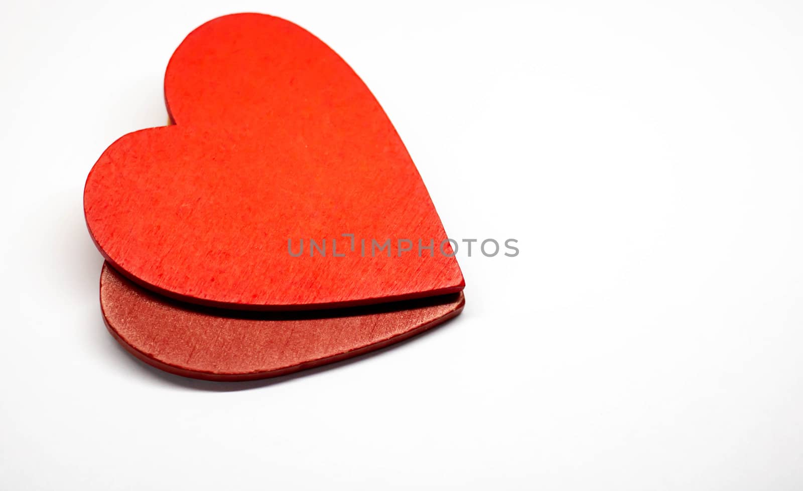 One wooden heart isolated on white background.