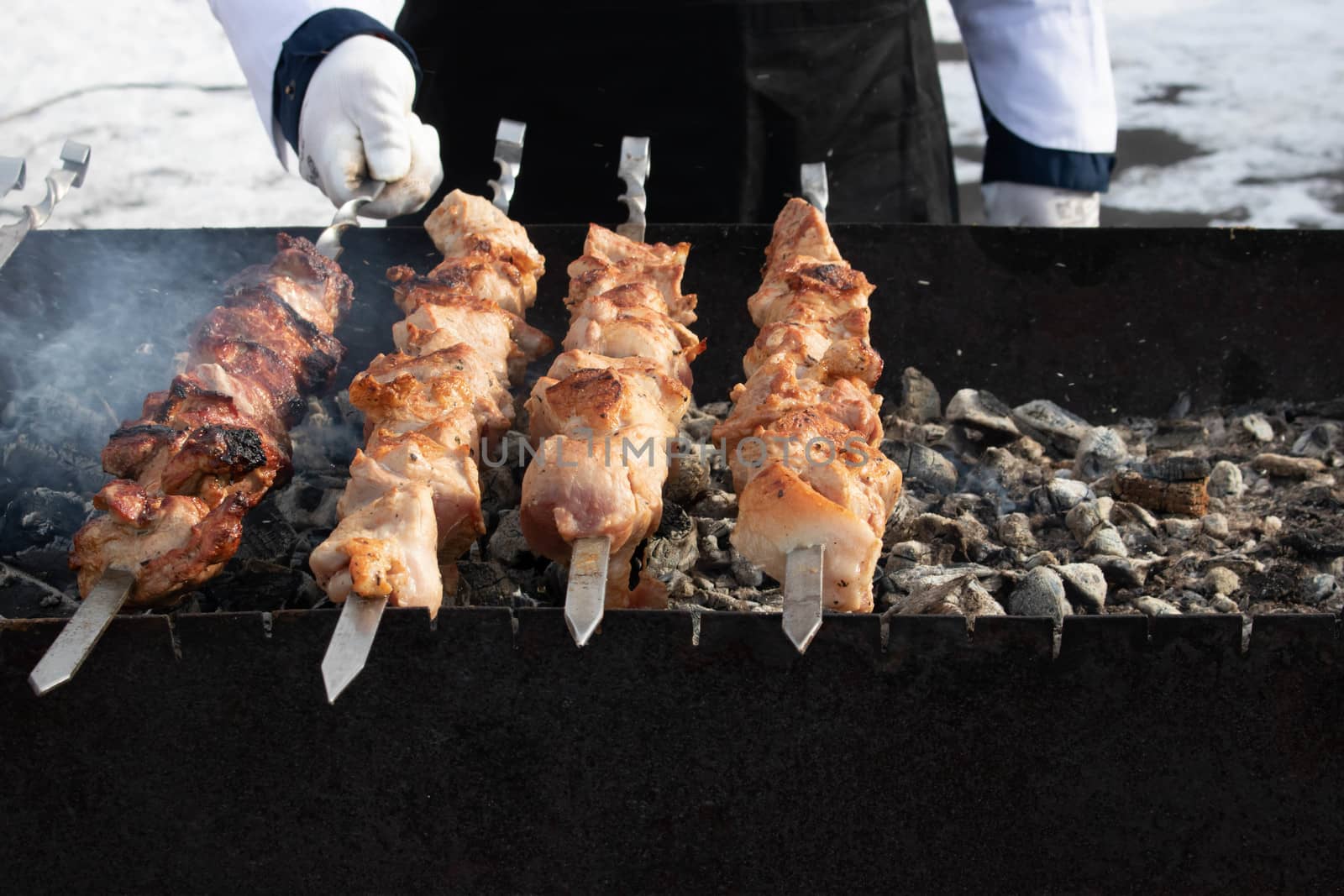 Traditional Russian shashlik on a barbecue skewer, cooking outdoor activities meat on skewers
