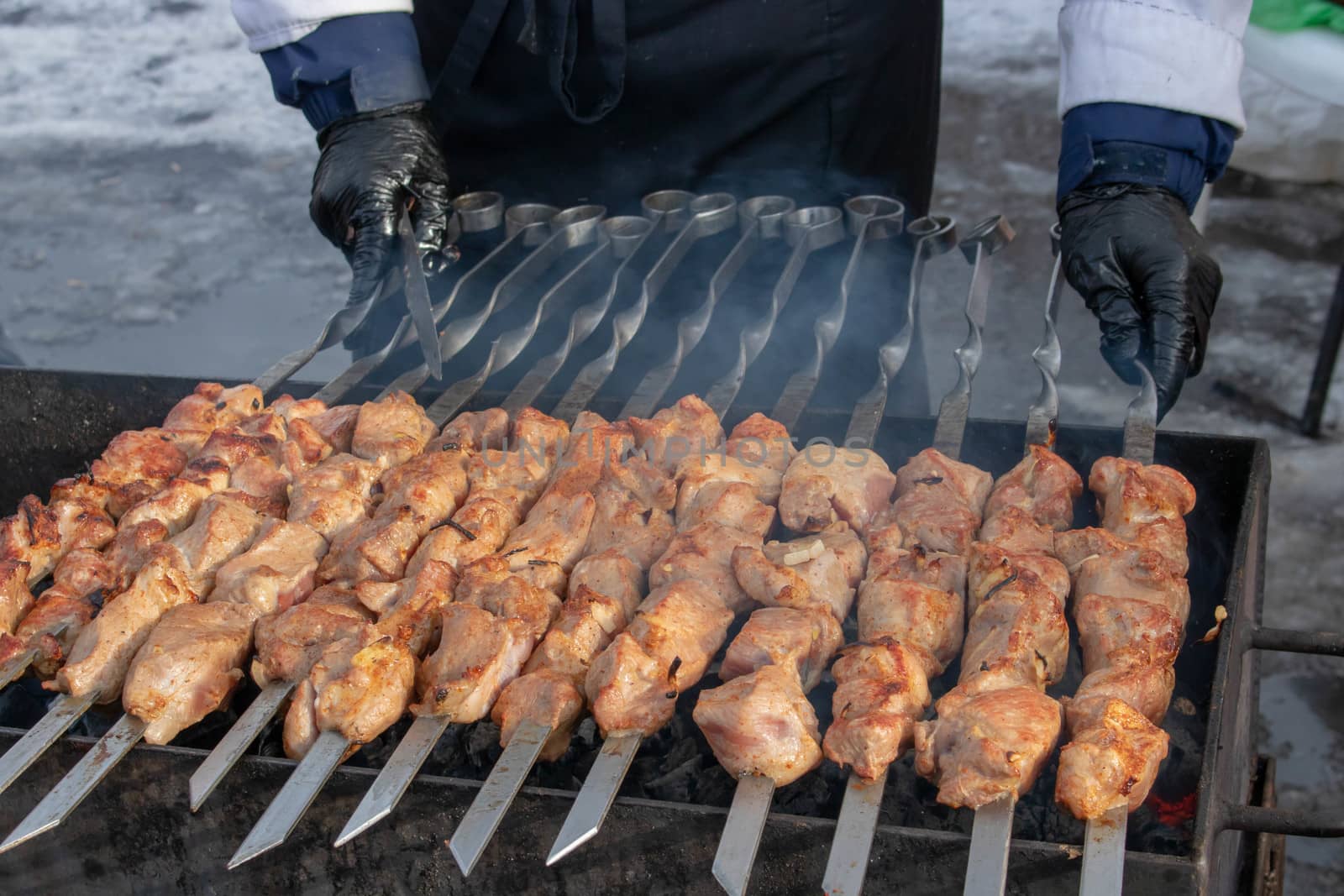 Traditional Russian shashlik on a barbecue skewer, cooking outdoor activities meat on skewers