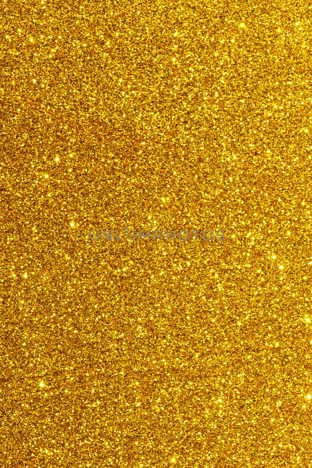 Shiny golden bokeh glitter lights abstract background, Christmas New Year party celebration concept