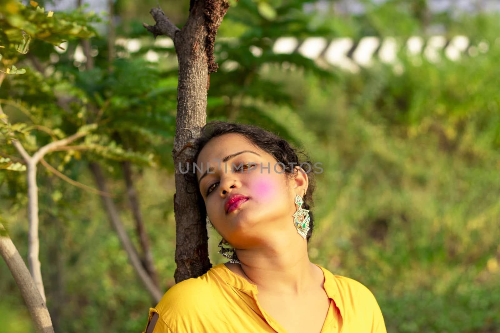 A beautiful Indian female model poses in a photo by 9500102400