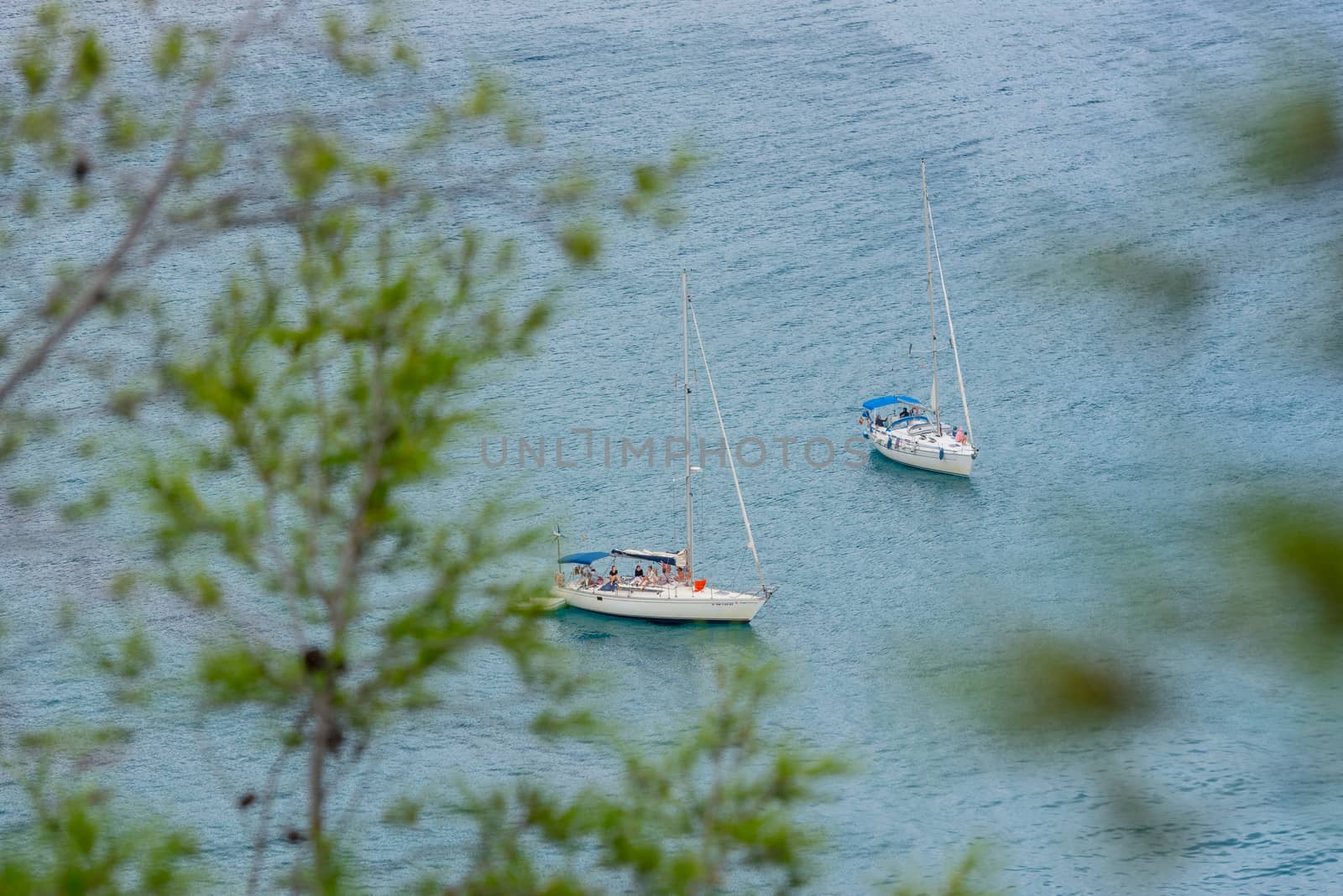 Boats in the Beautiful Cala Futadera beach is one of the few rem by martinscphoto