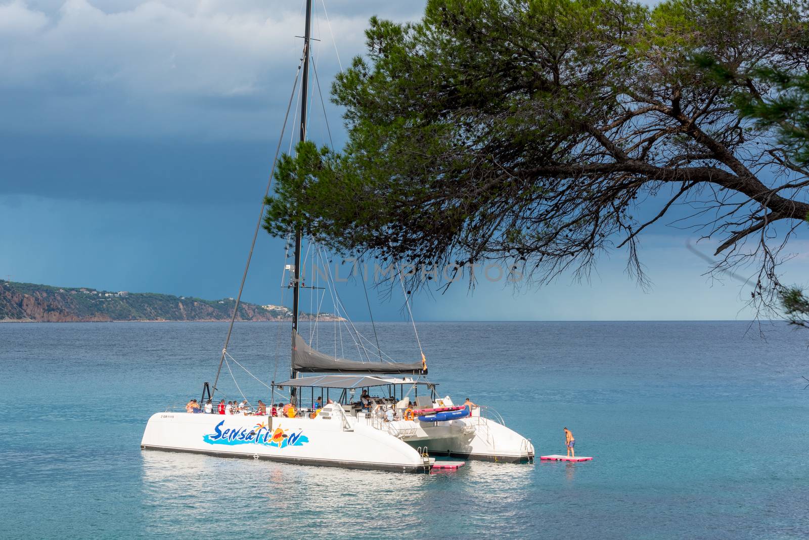 Boats in the Beautiful Cala Futadera beach is one of the few rem by martinscphoto