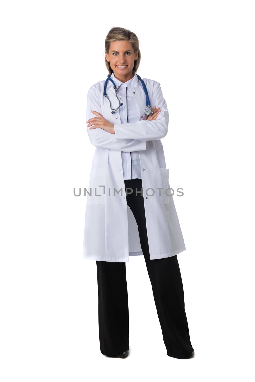 Female medical doctor with stethoscope standing with arms crossed isolated on white background, full length portrait