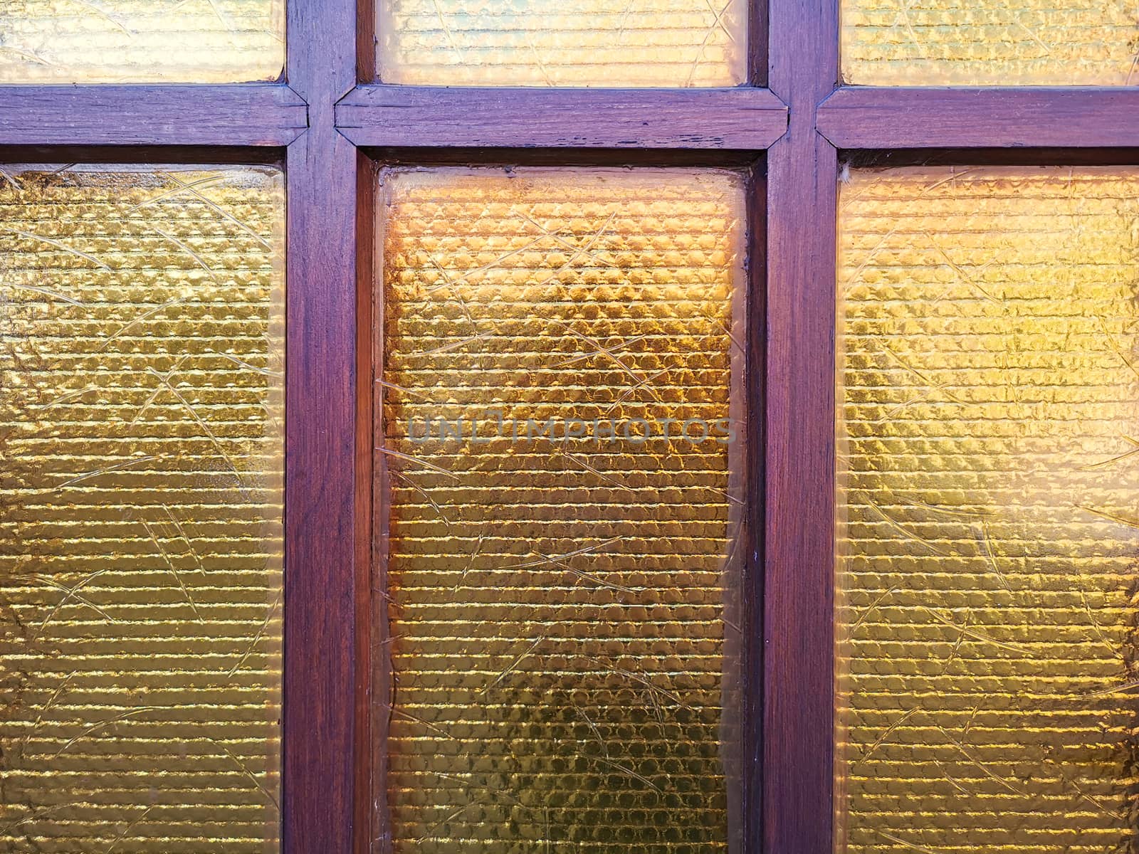 Window with wood and yellow reflection background