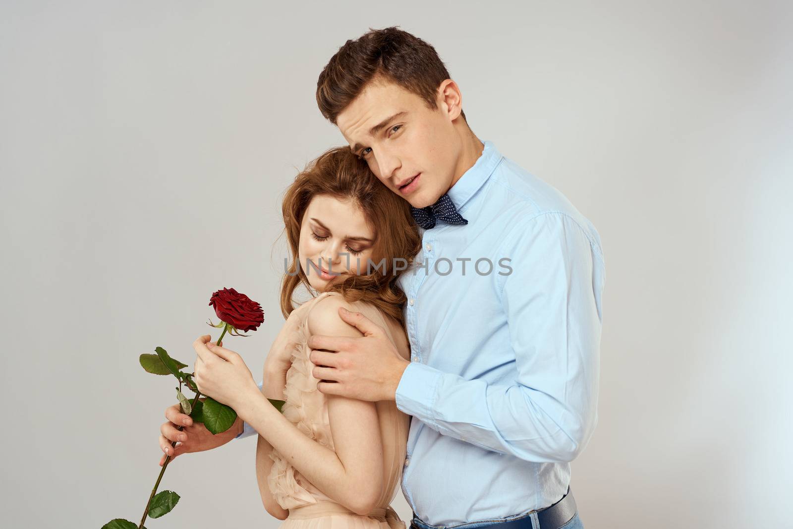 man giving woman roses relationship charm lifestyle embrace lifestyle by SHOTPRIME