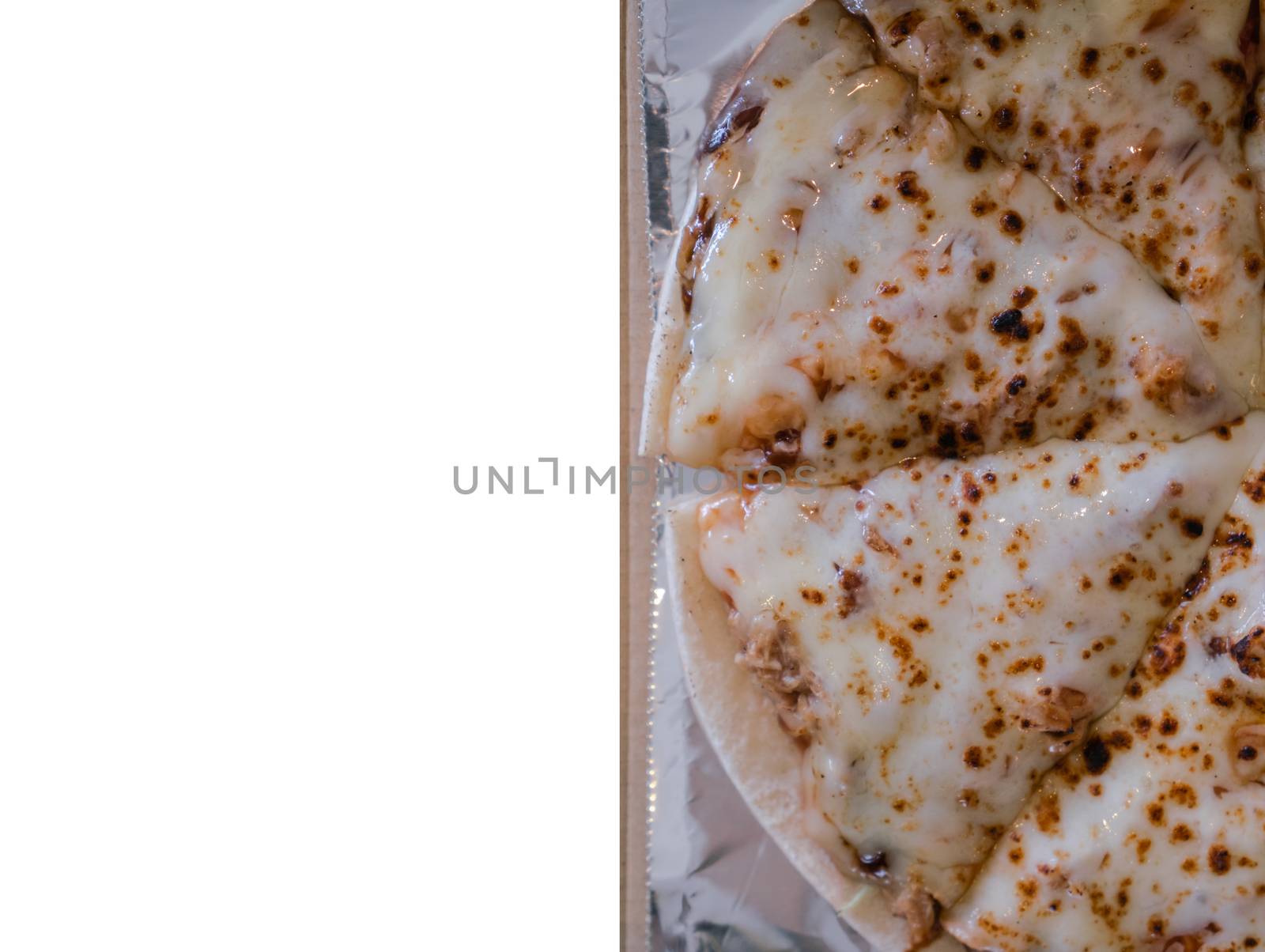Pizza cheese with copy space on isolated white by Buttus_casso