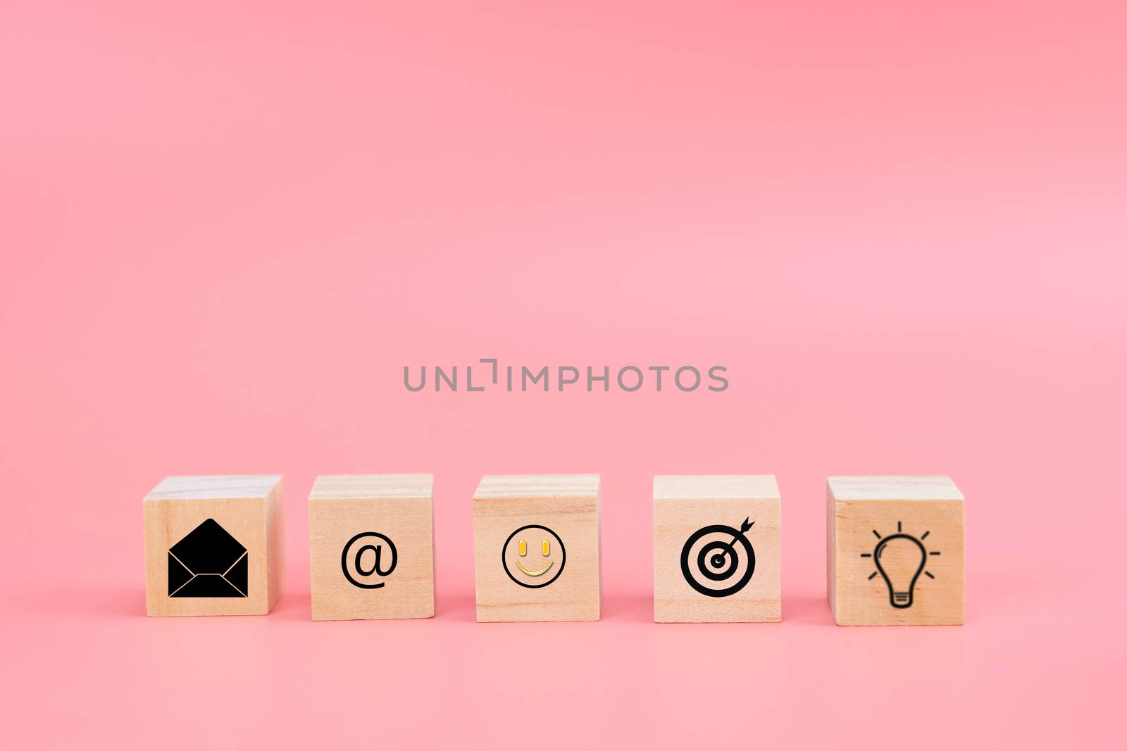 Modern icon on wooden block with copy space by Buttus_casso