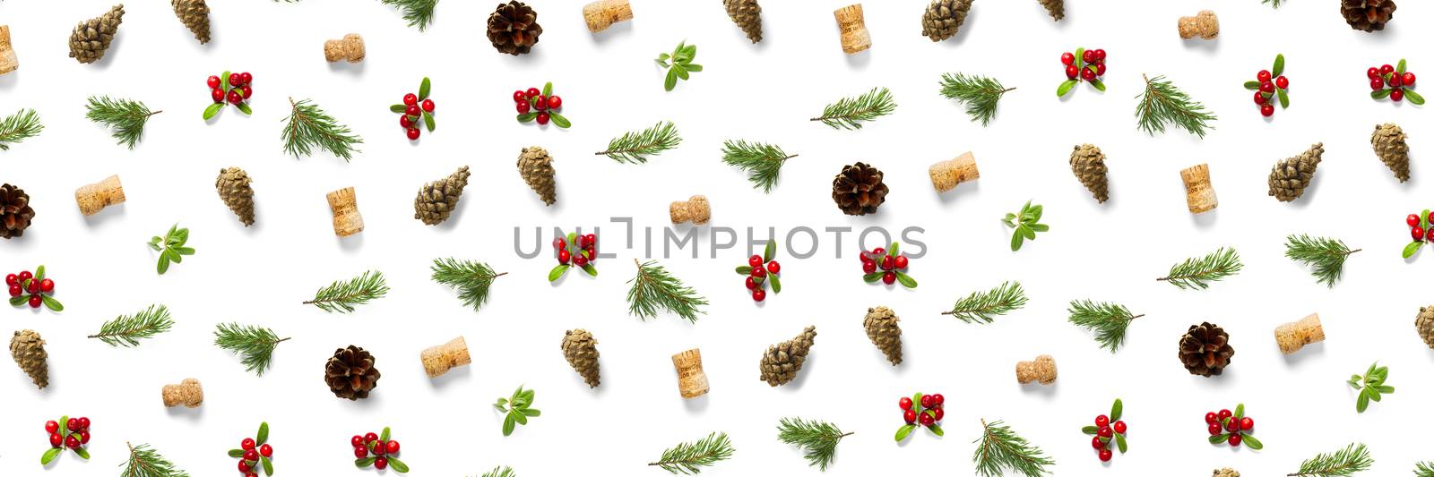 christmas background with pine cone, wine cork, pine twig and lingonberry. christmas background on white backdrop