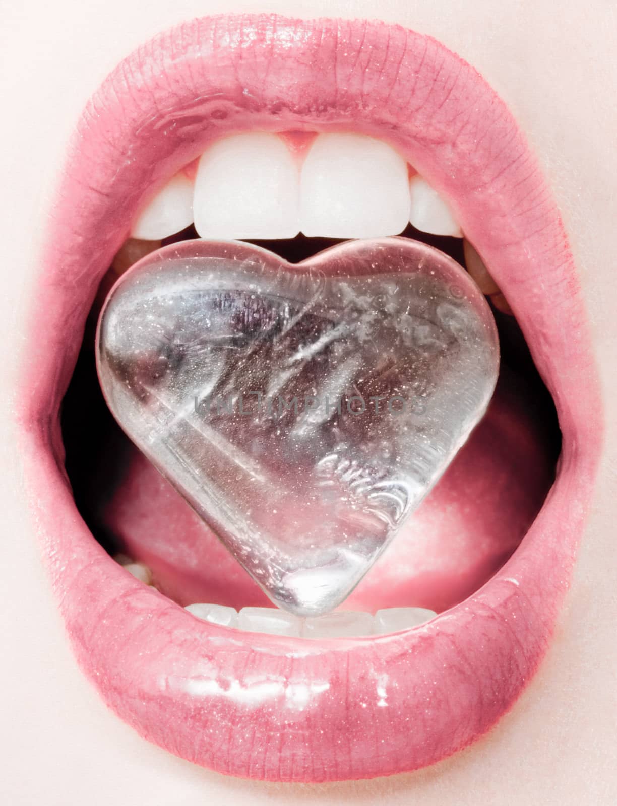 Icy heart, female lips with glossy lipstick and white teeth for glamour and beauty brand ads