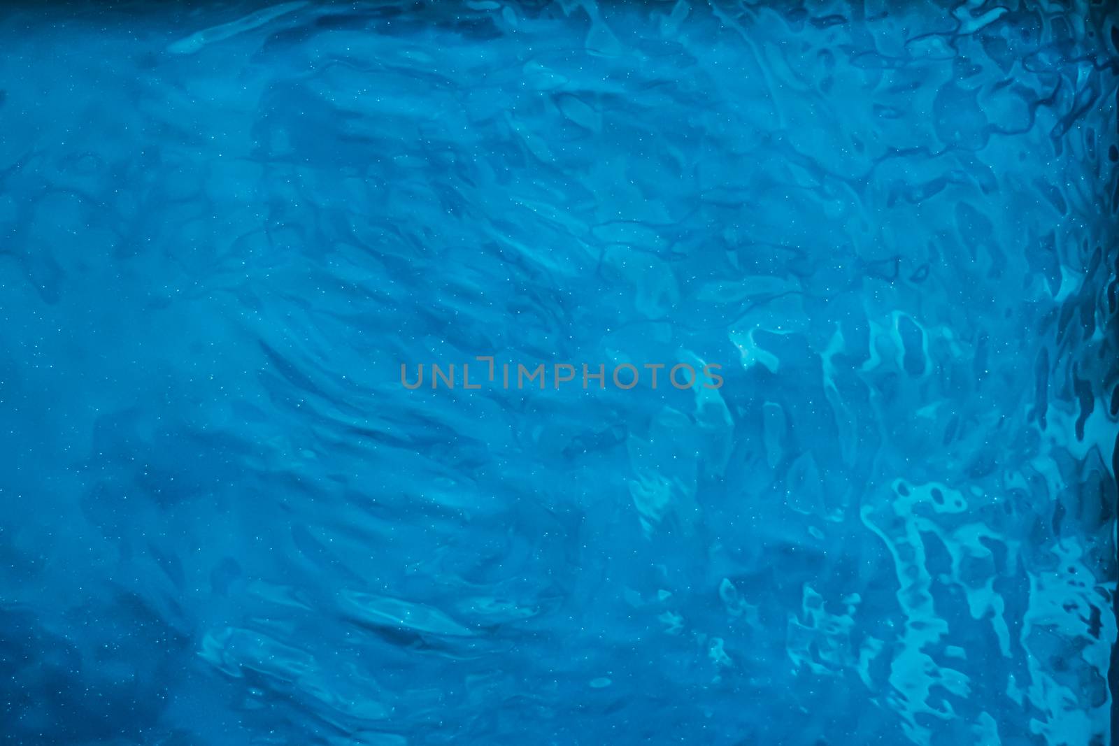 Blue water texture as abstract background, swimming pool and waves design by Anneleven