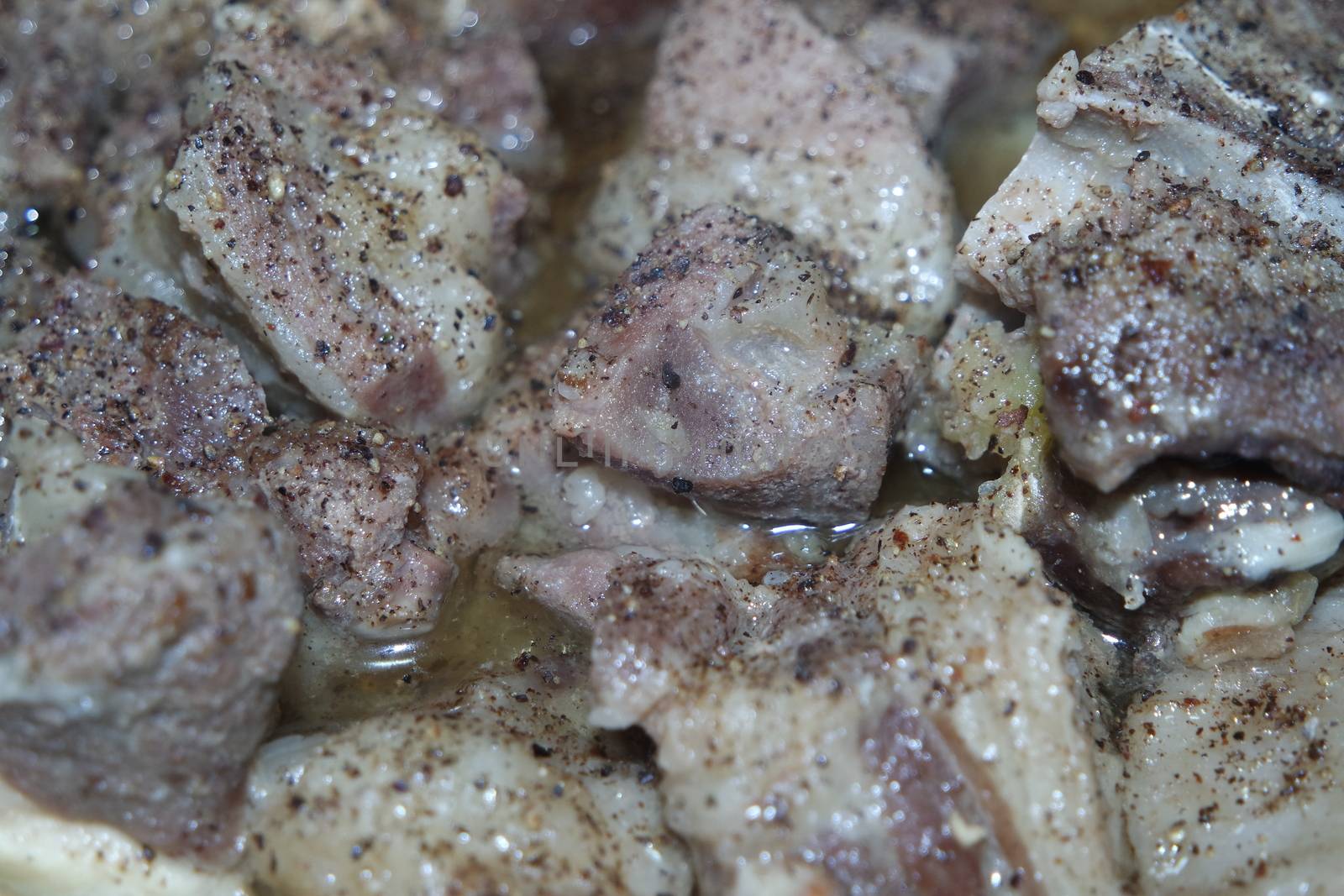 Top view of siri paaye or paya dish garnished with diced ginger, long coriander and black pepper. This dish is popular in Pakistan and Bangladesh