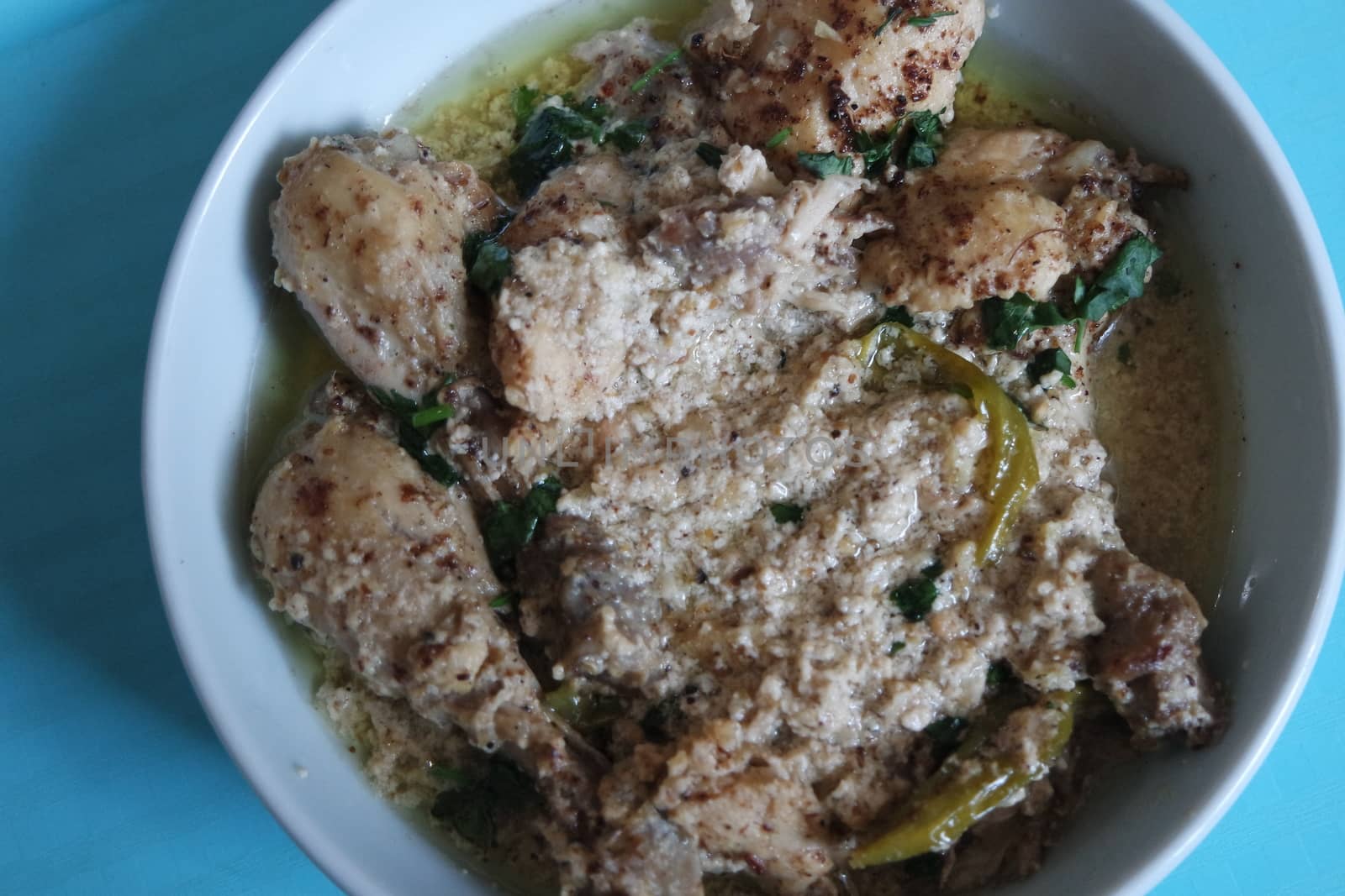 Homemade chicken qorma or white qorma dish. Traditional dish for parties and ceremonial purpose popular in South Asian countries like Pakistan, India and Bangladesh