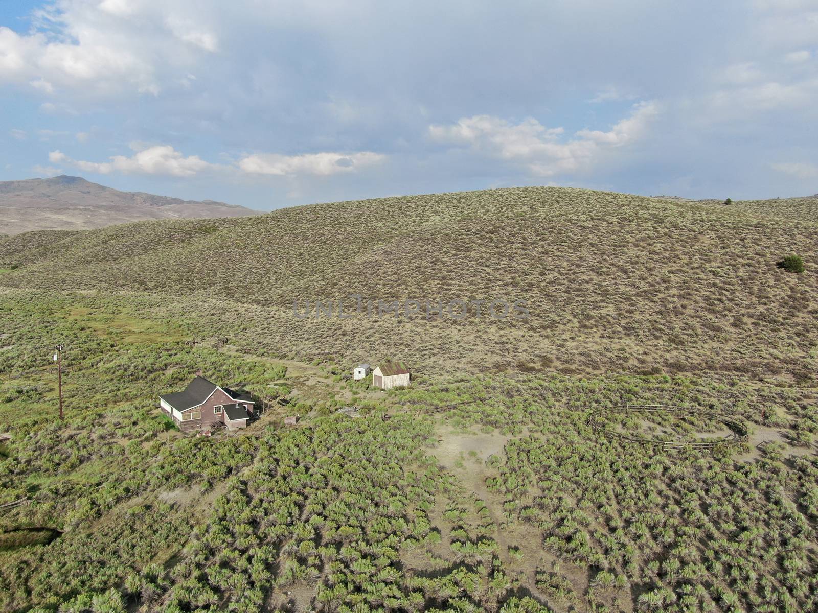 Aerial view of old wood ranch in the middle of the desert valley in Lee Vining, California, USA